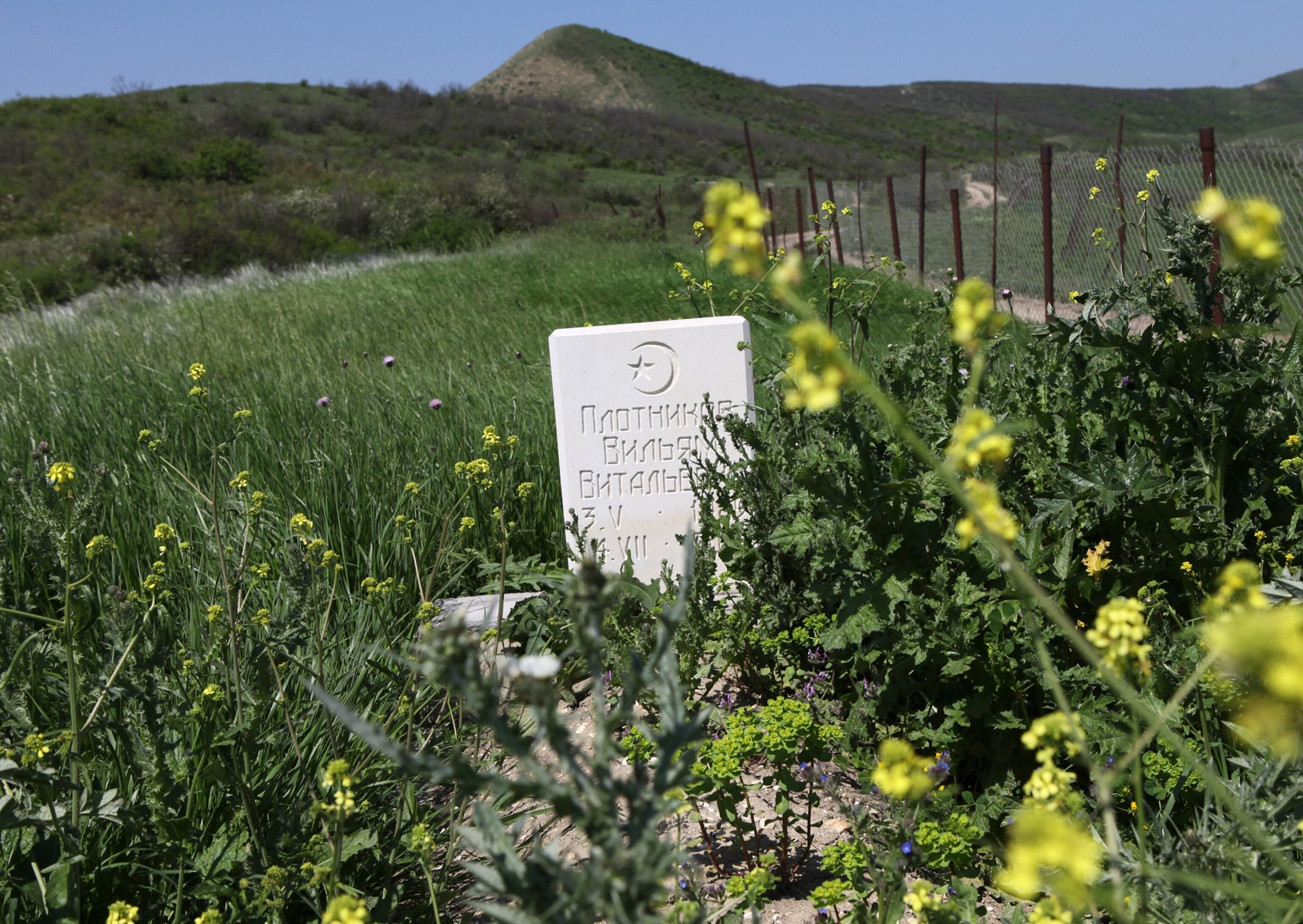 The grave of Canadian Muslim convert William Plotnikov in Utamysh, Dagestan, Russia.