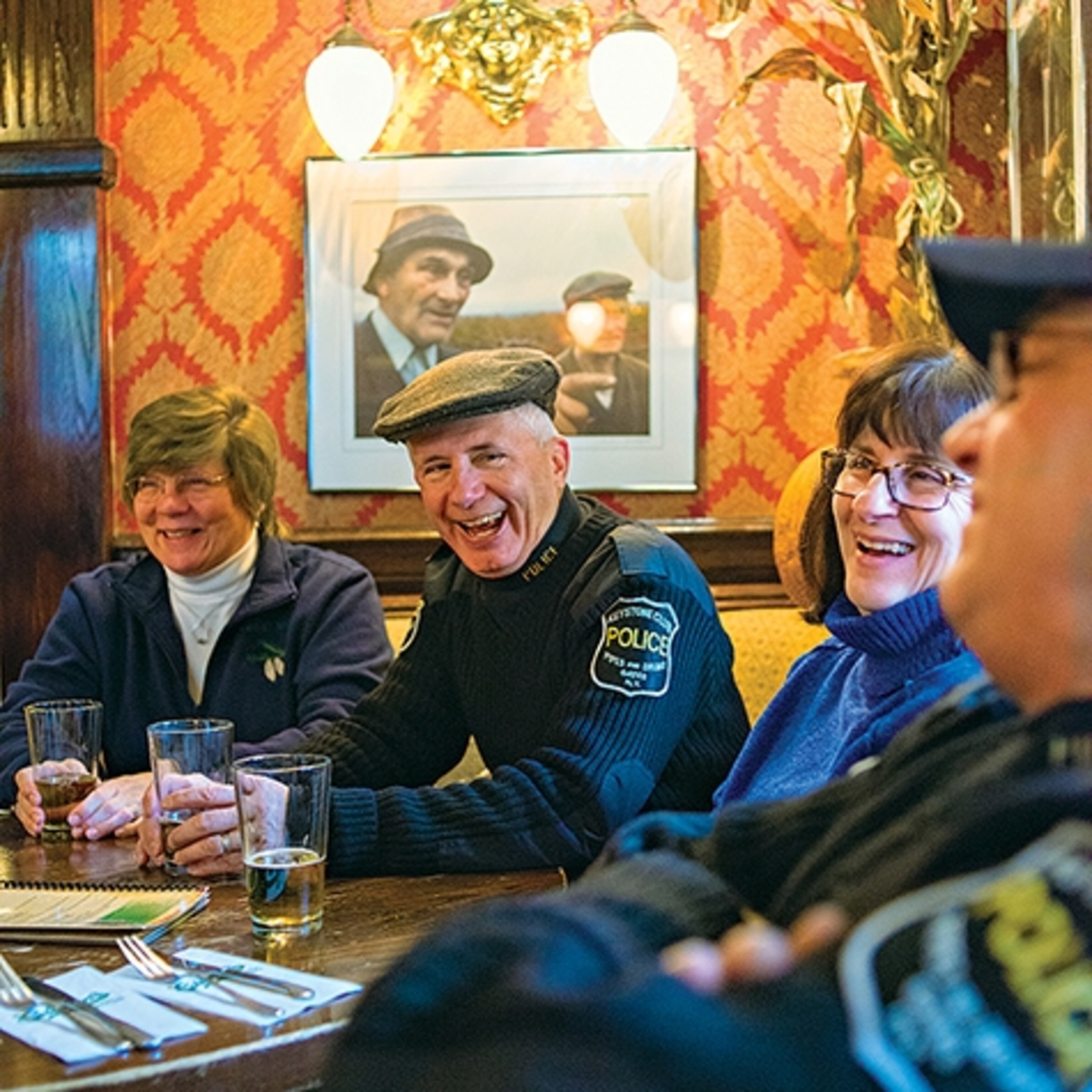 Glen Johnson enjoys a beer with friends at Coleman's Irish Pub, a 1933 saloon featuring traditional pub fare and live music in Syracuse's historic Tipperary Hill. (Photograph by Alexandra Hootnick)