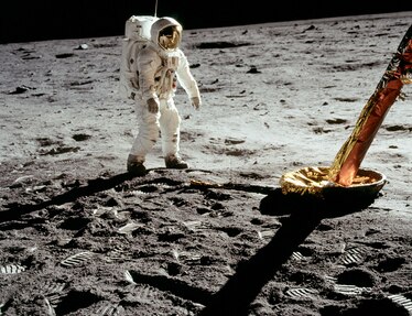 An astronaut is seen on the surface of the moon.