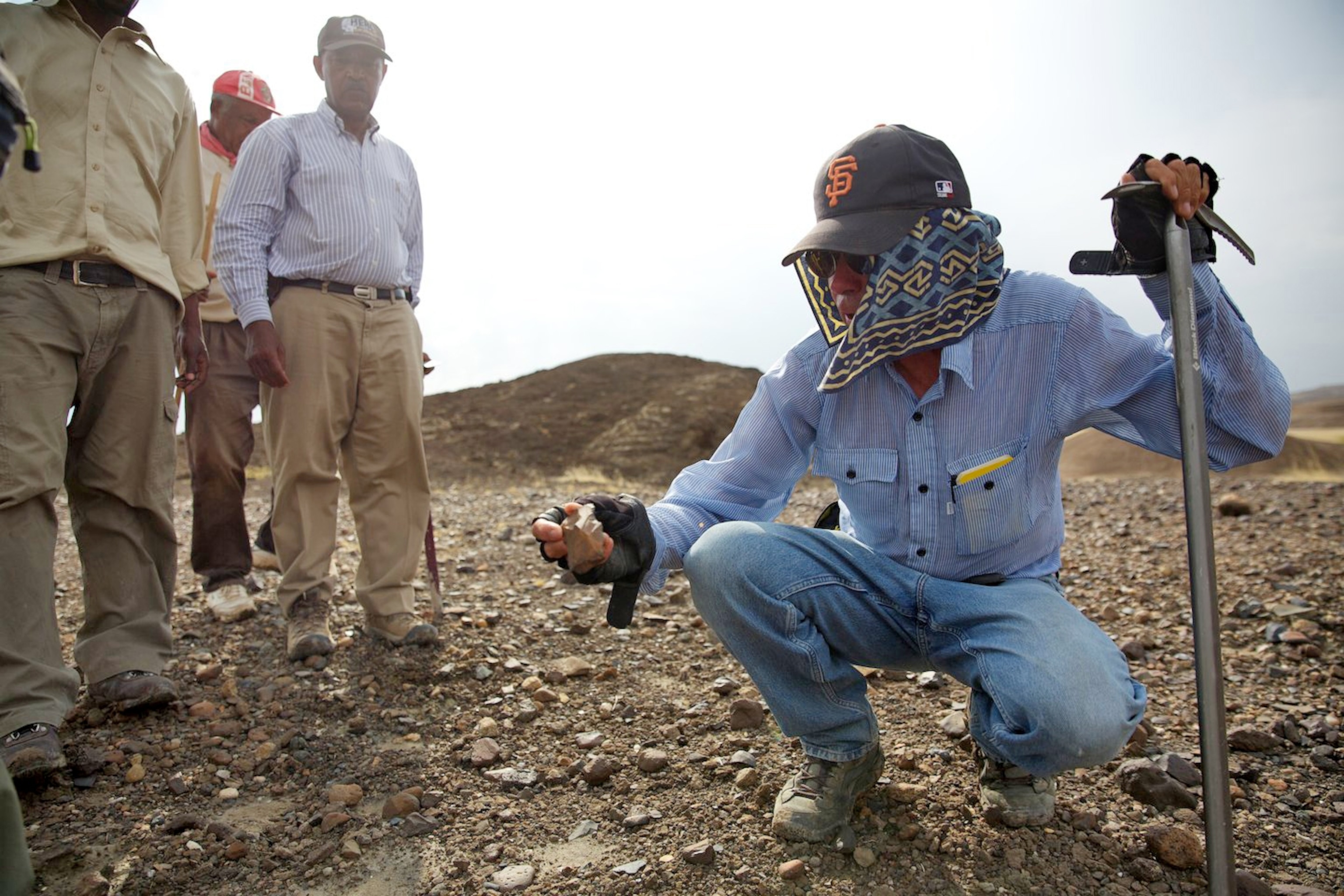 Paleoanthropologist Tim White, co-director of the Middle Awash Project, searches for fossils in Ethiopia’s Afar region. In “The Glorious Boneyard” Salopek explored the roots of human restlessness.