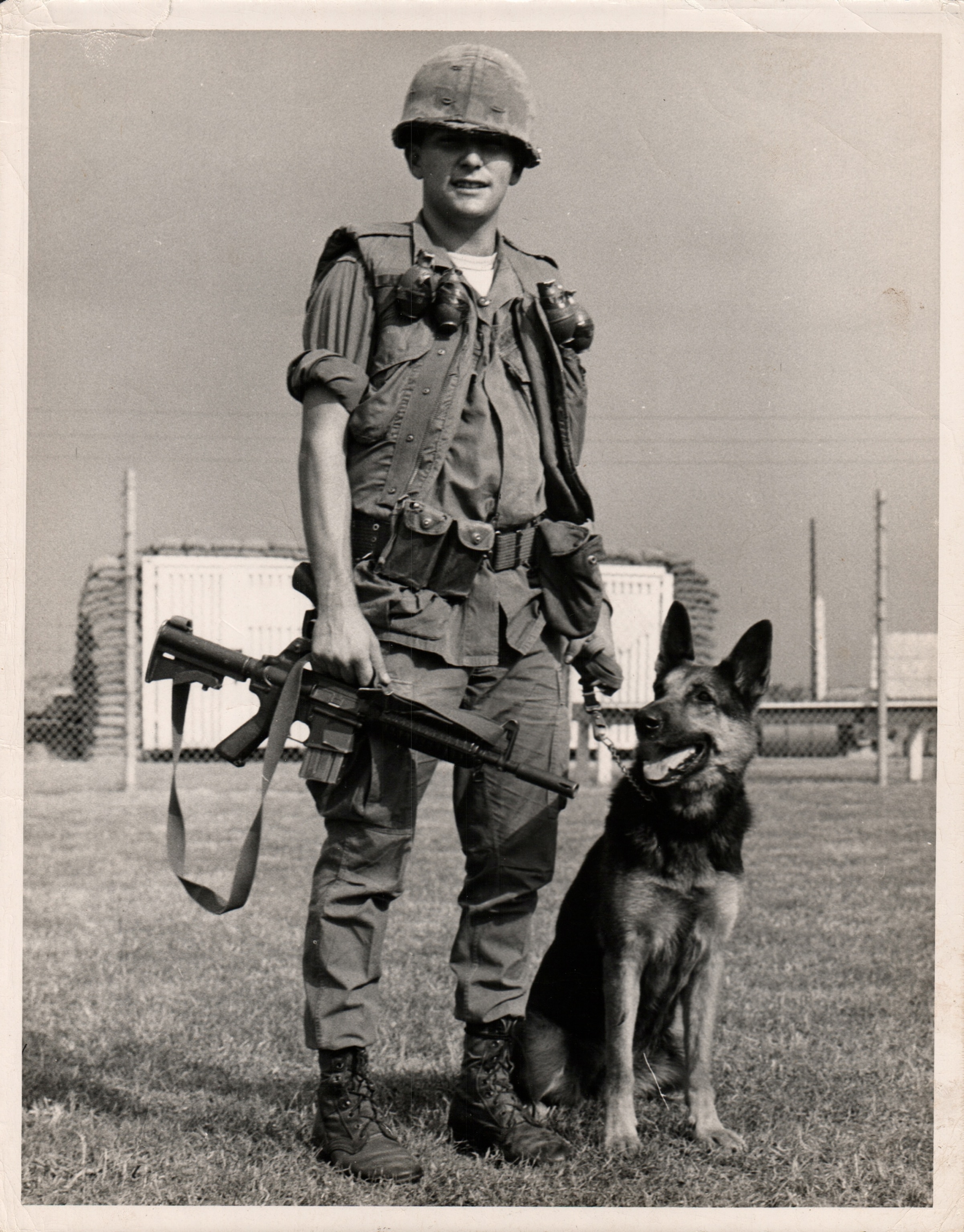 a sentry-dog handler from the U.S. Air Force with his dog