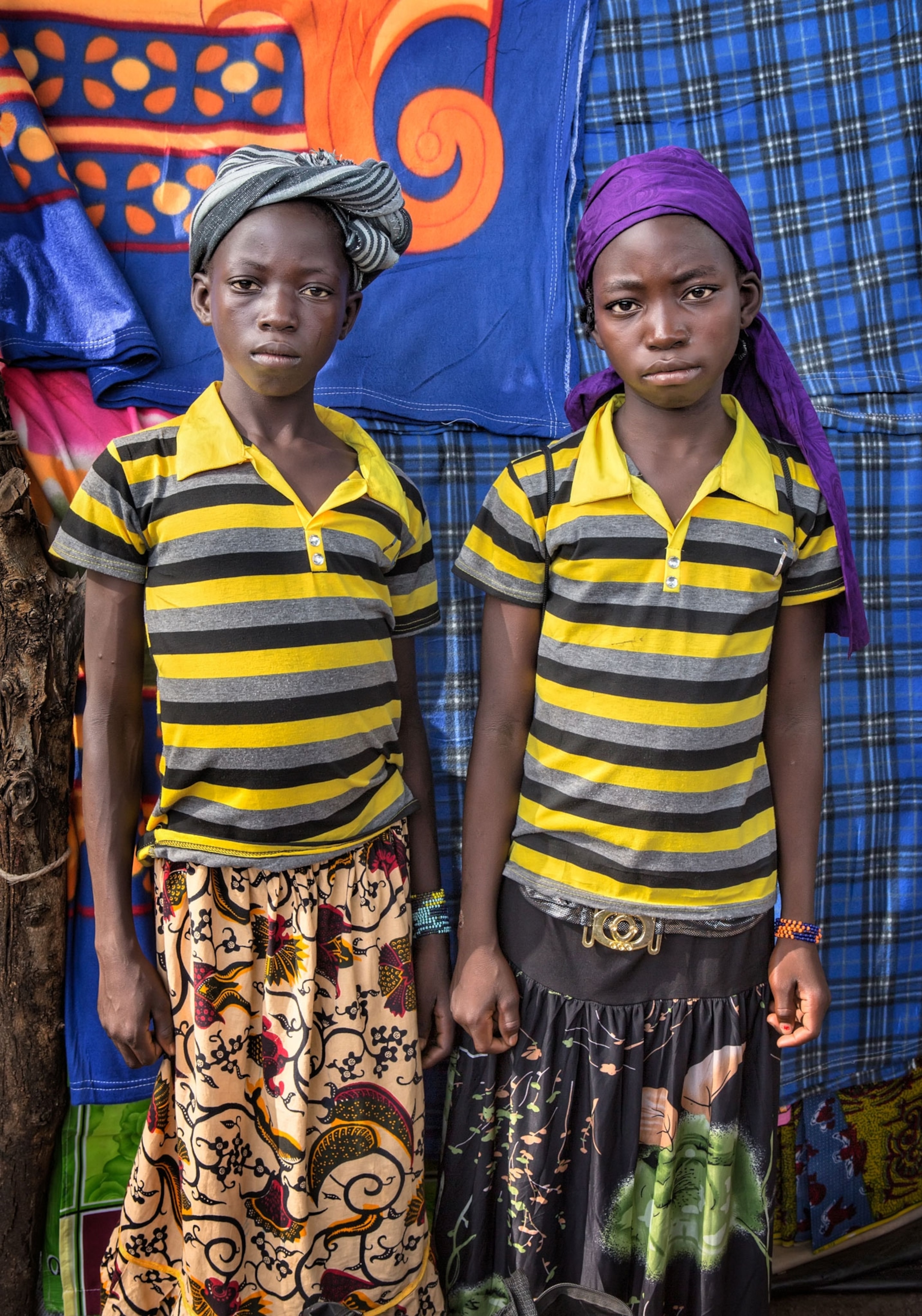 a young women at an outdoor market in Burkina Faso