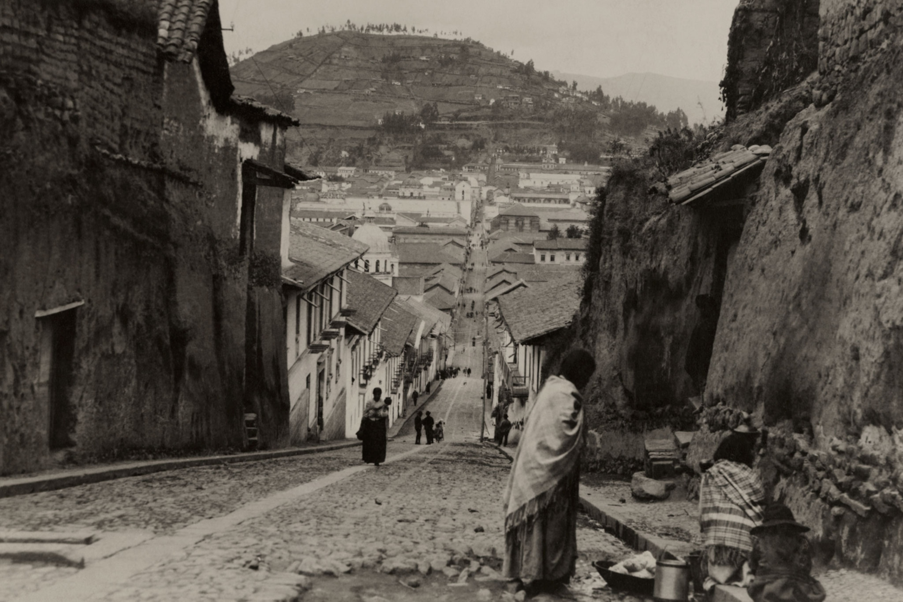 people walking down the street in Quito, Ecuador