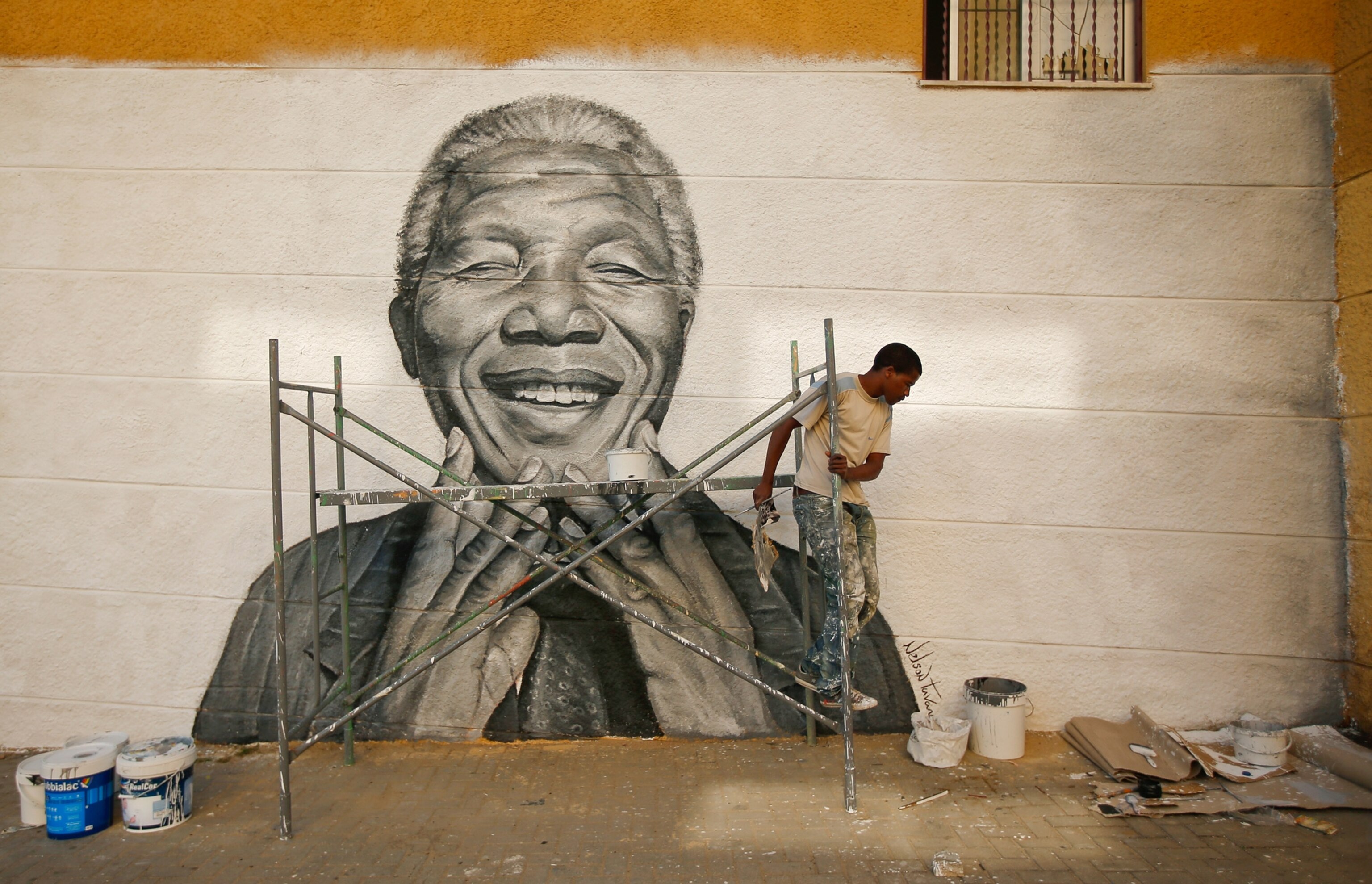 a portrait of Mandela on a wall in Lisbon, Portugal