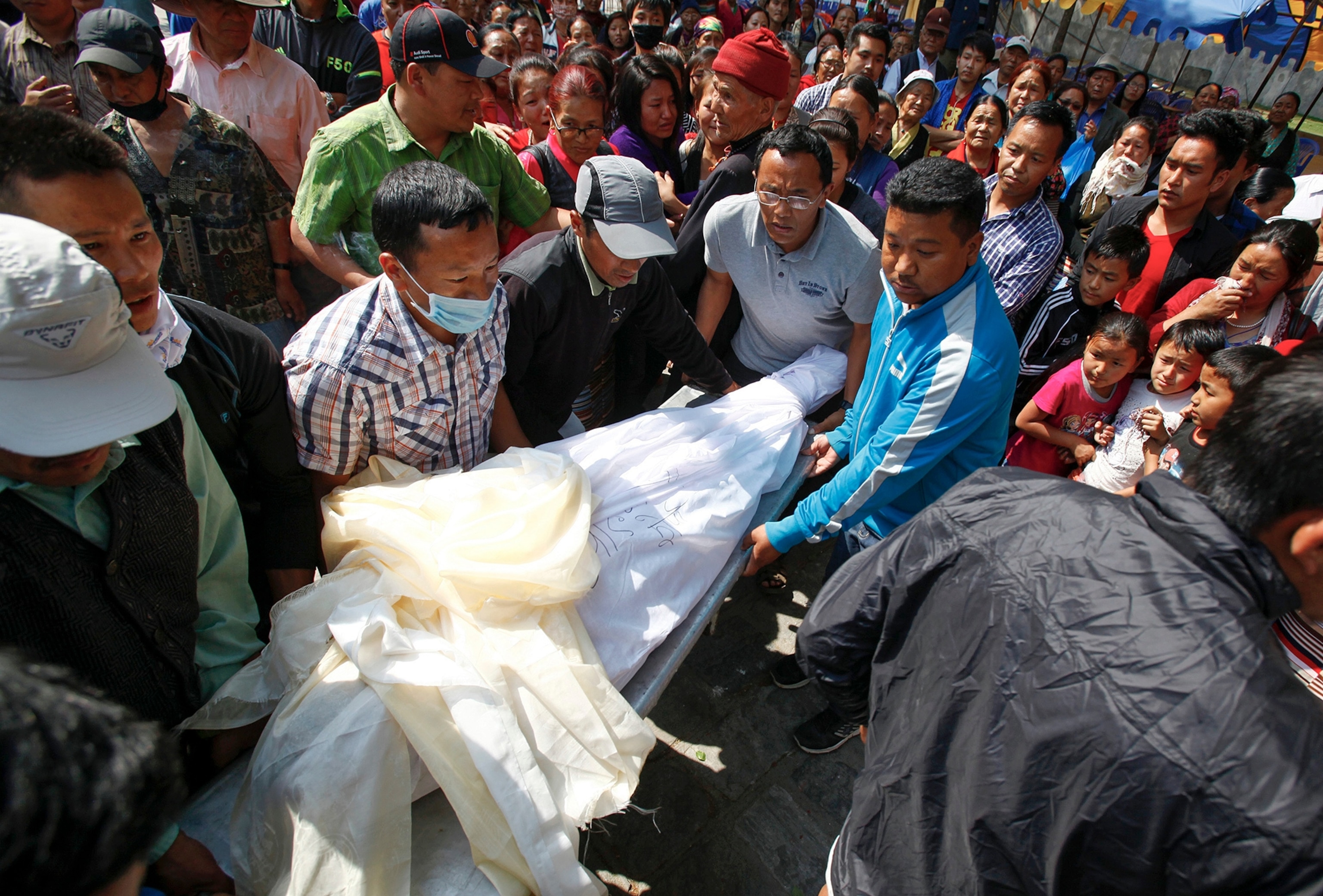 a family member mourning victims of the Mount Everest avalanche.