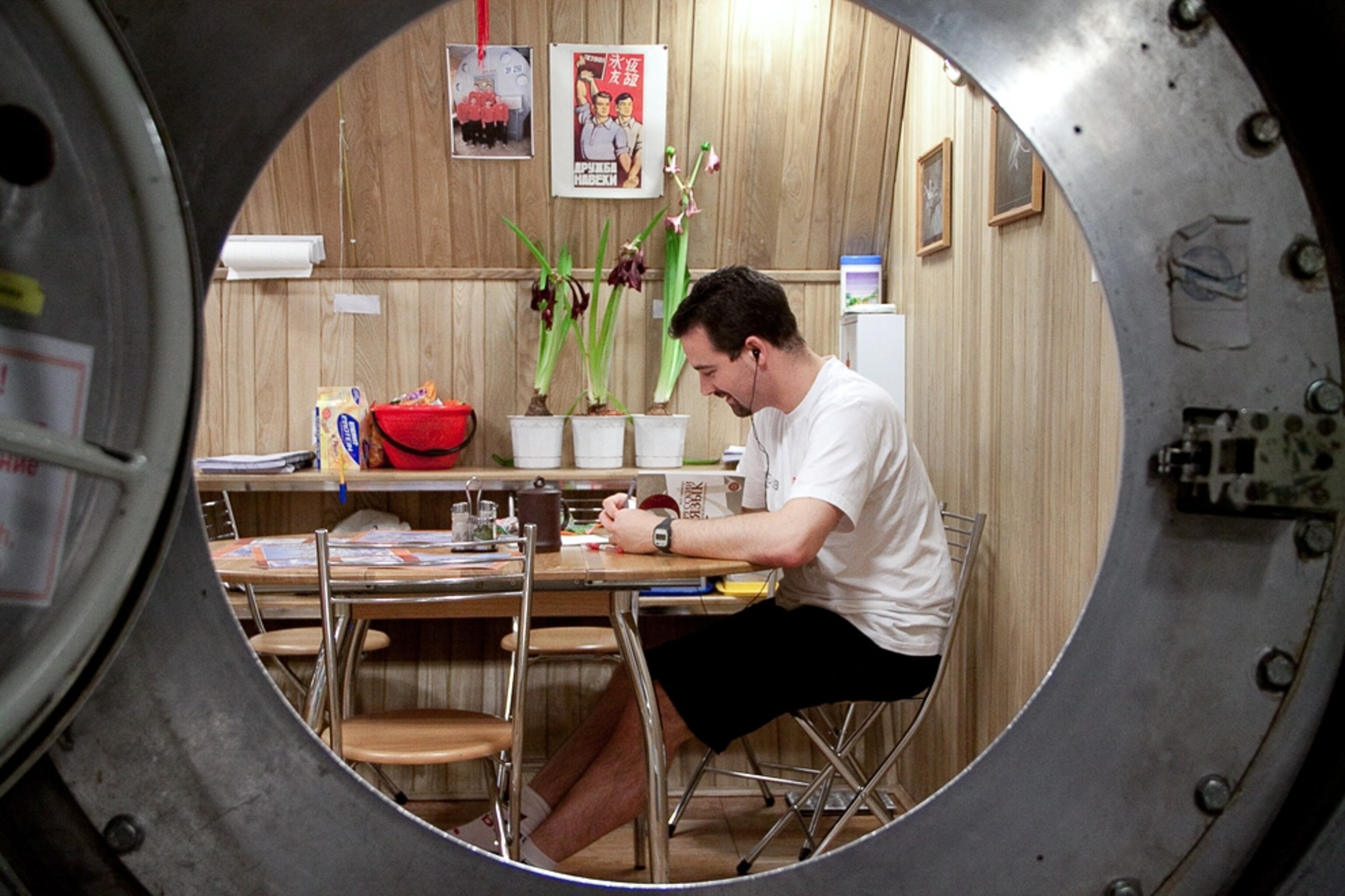 Mars500 picture: A crew member at the ship's kitchen table