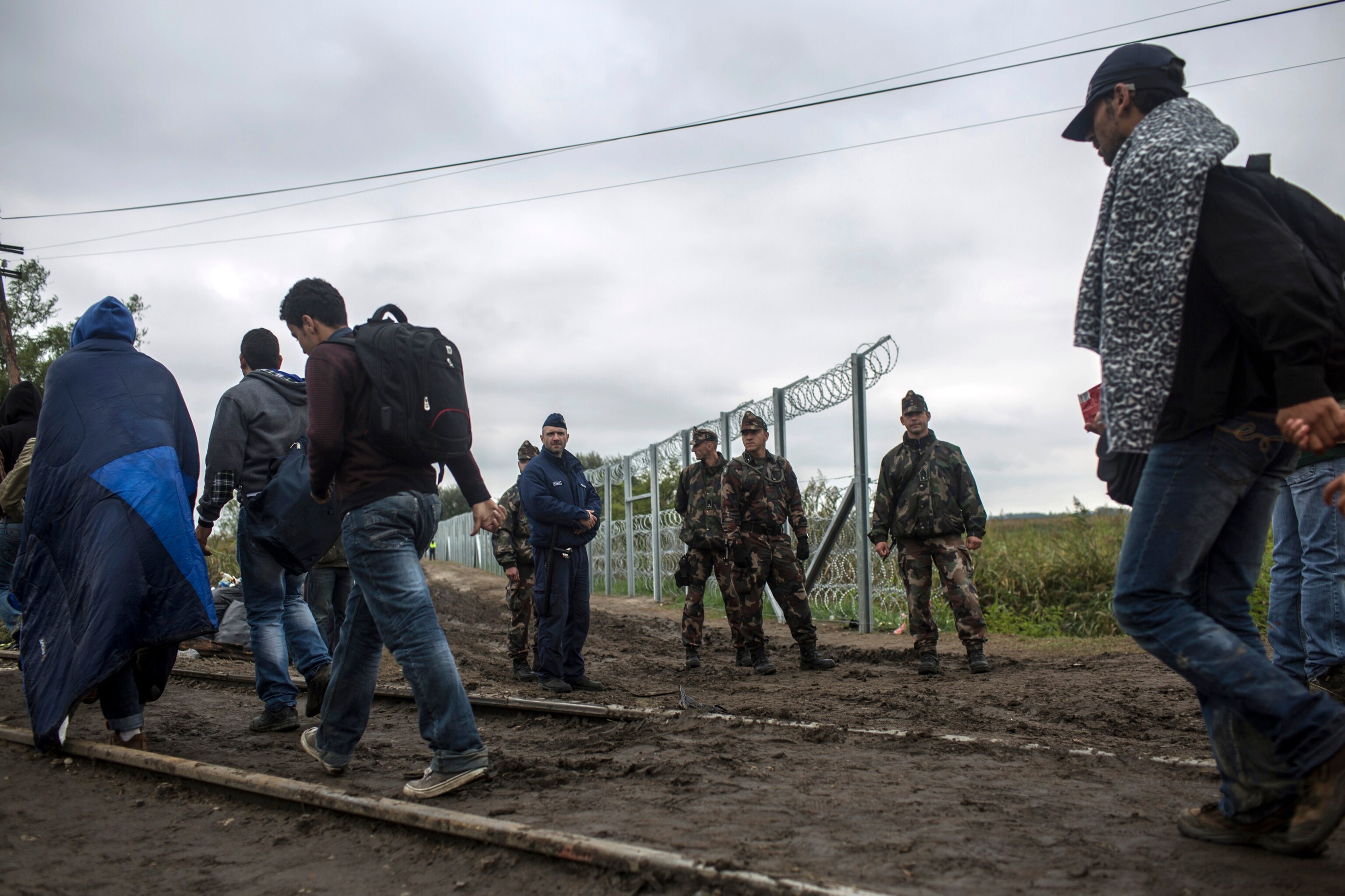 Hungarian military patrol the Hungarian-Serbian border as refugees cross into Hungary