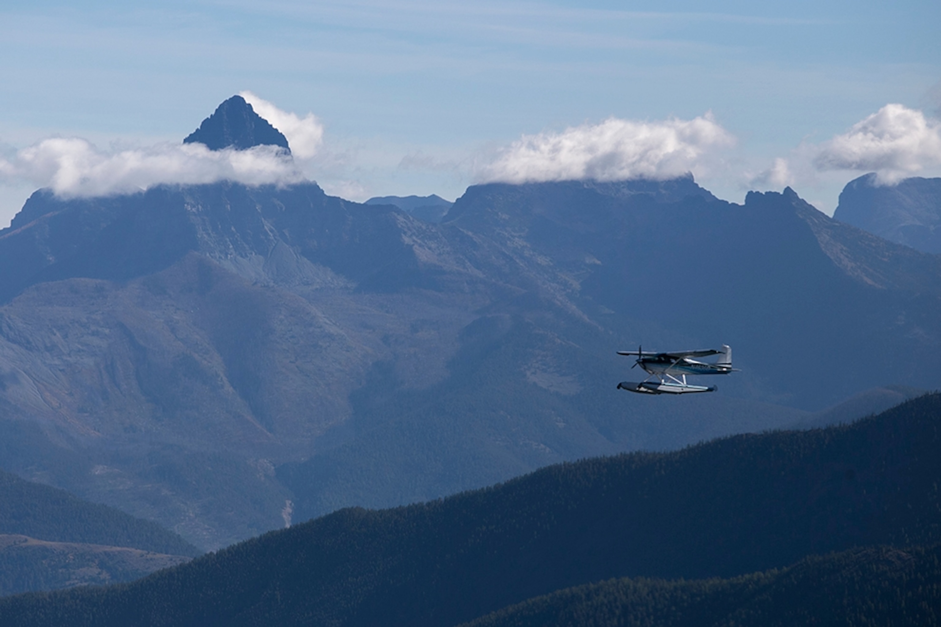 a floatplane flying above the Bob Marshall Wilderness in Montana