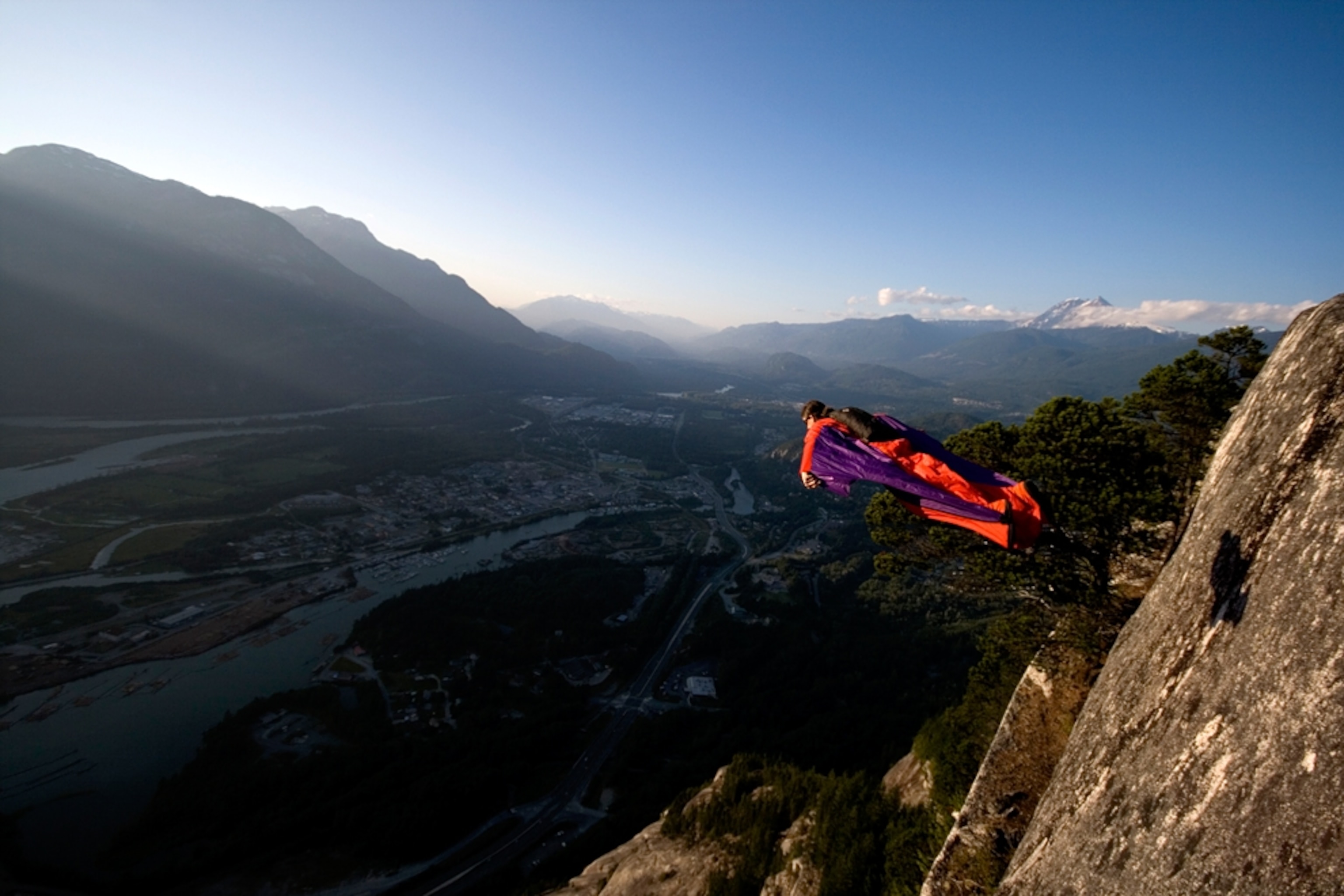 Dean Potter BASE jumps from the first peak of the Squamish Chief.