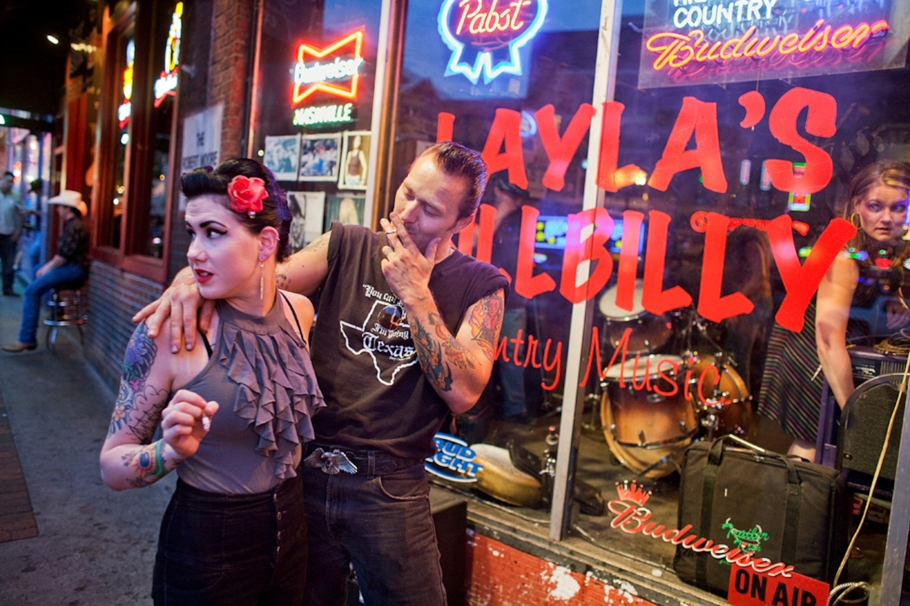 a couple on Lower Broadway in Nashville, Tennessee