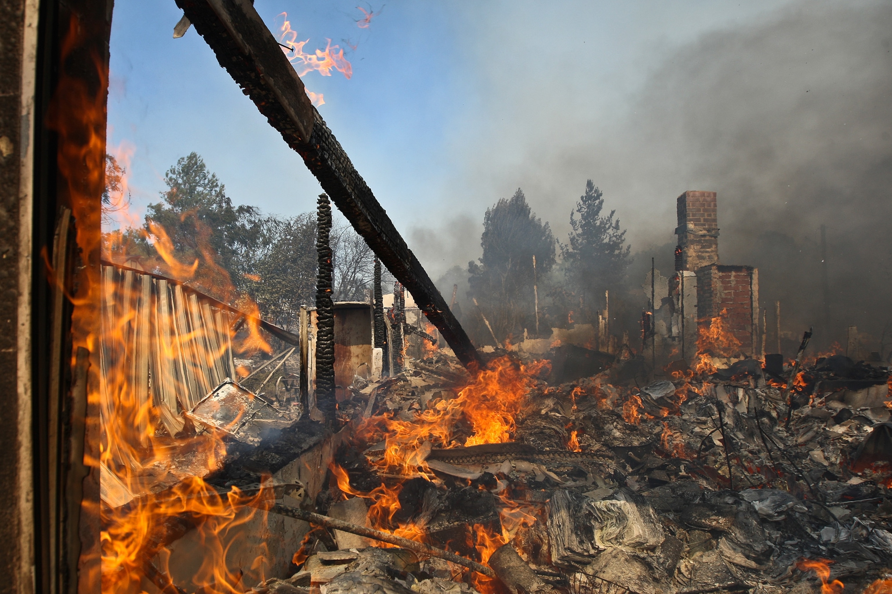 A house burns at the Cocos fire on May 15, 2014 in San Marcos, California.