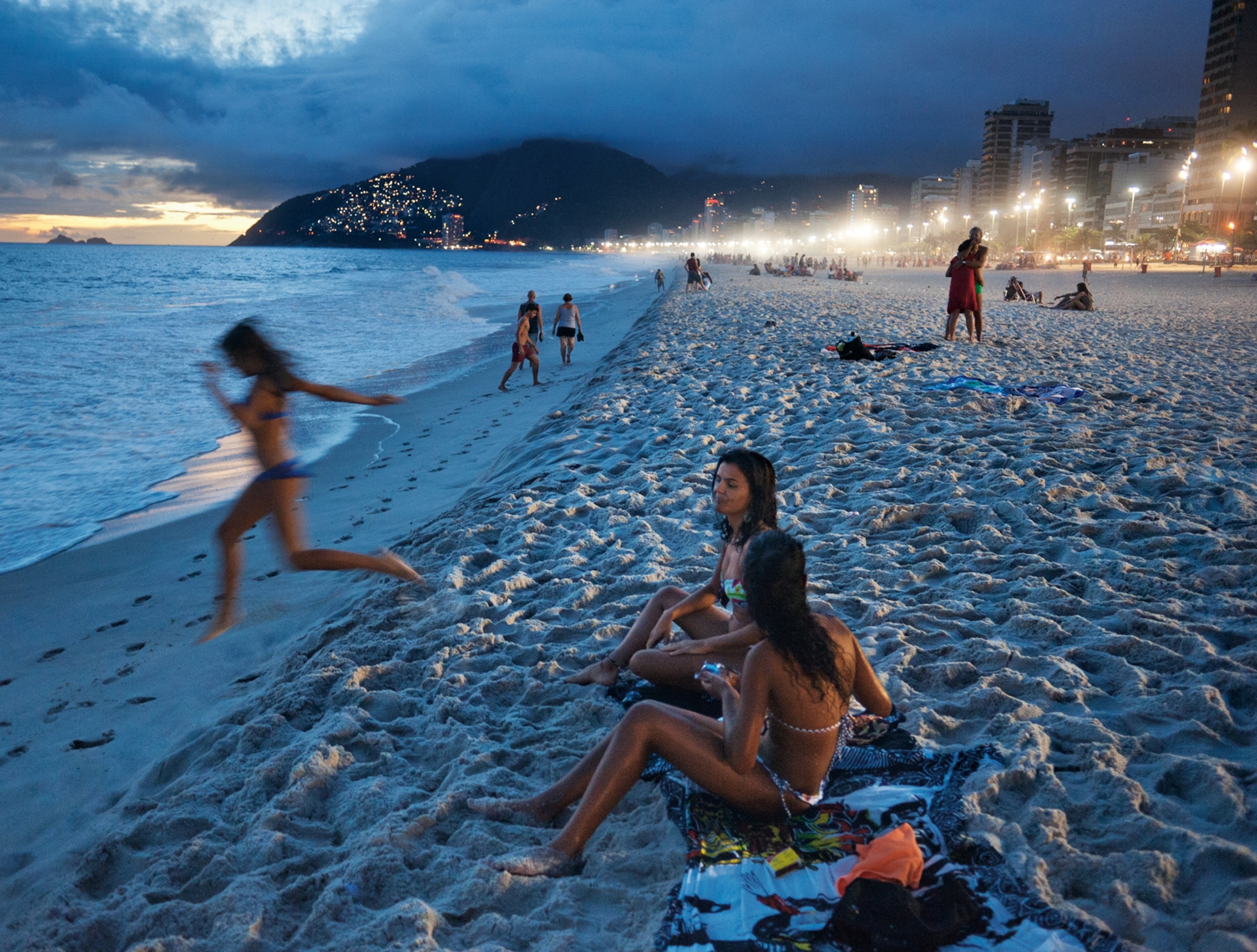 people enjoying a Rio beach in the evening