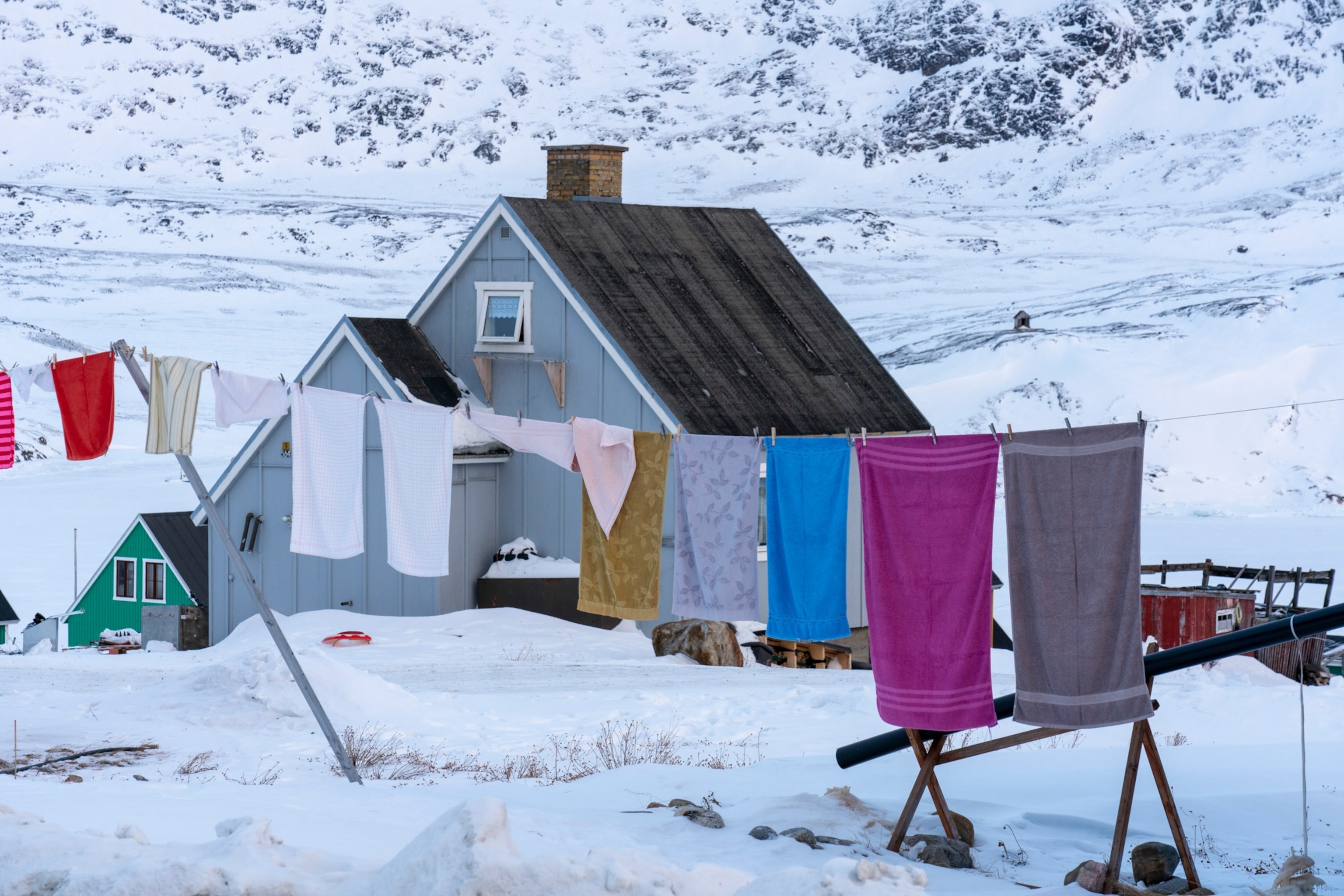 laundry drying outside a home in Qasigiannguit, West Greenland