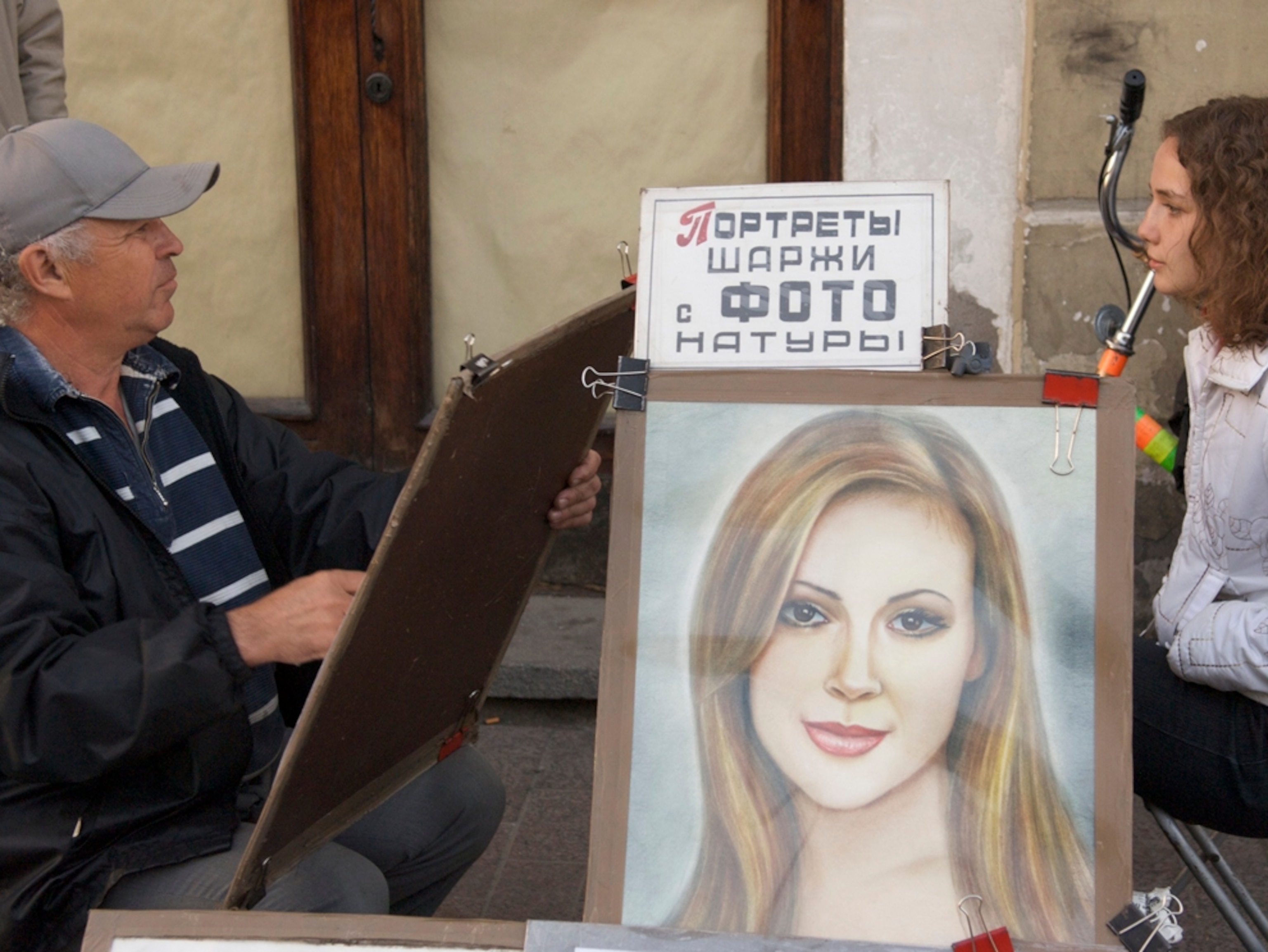 An artist sketches a portrait