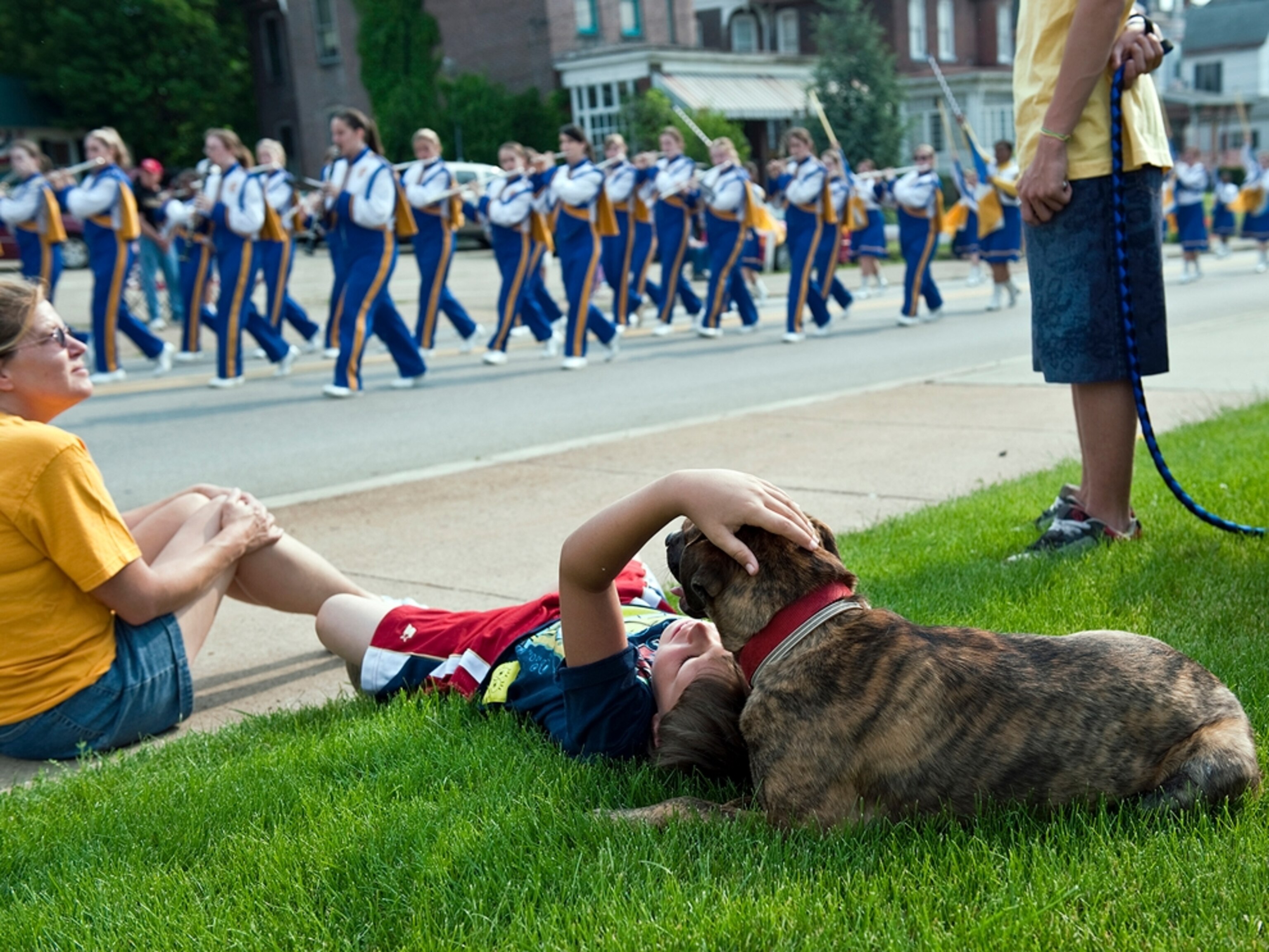 Dayna, Ryan, and Steven Spence watch the 2010 Memorial Day parade in Canonsburg, Pennsylvania.