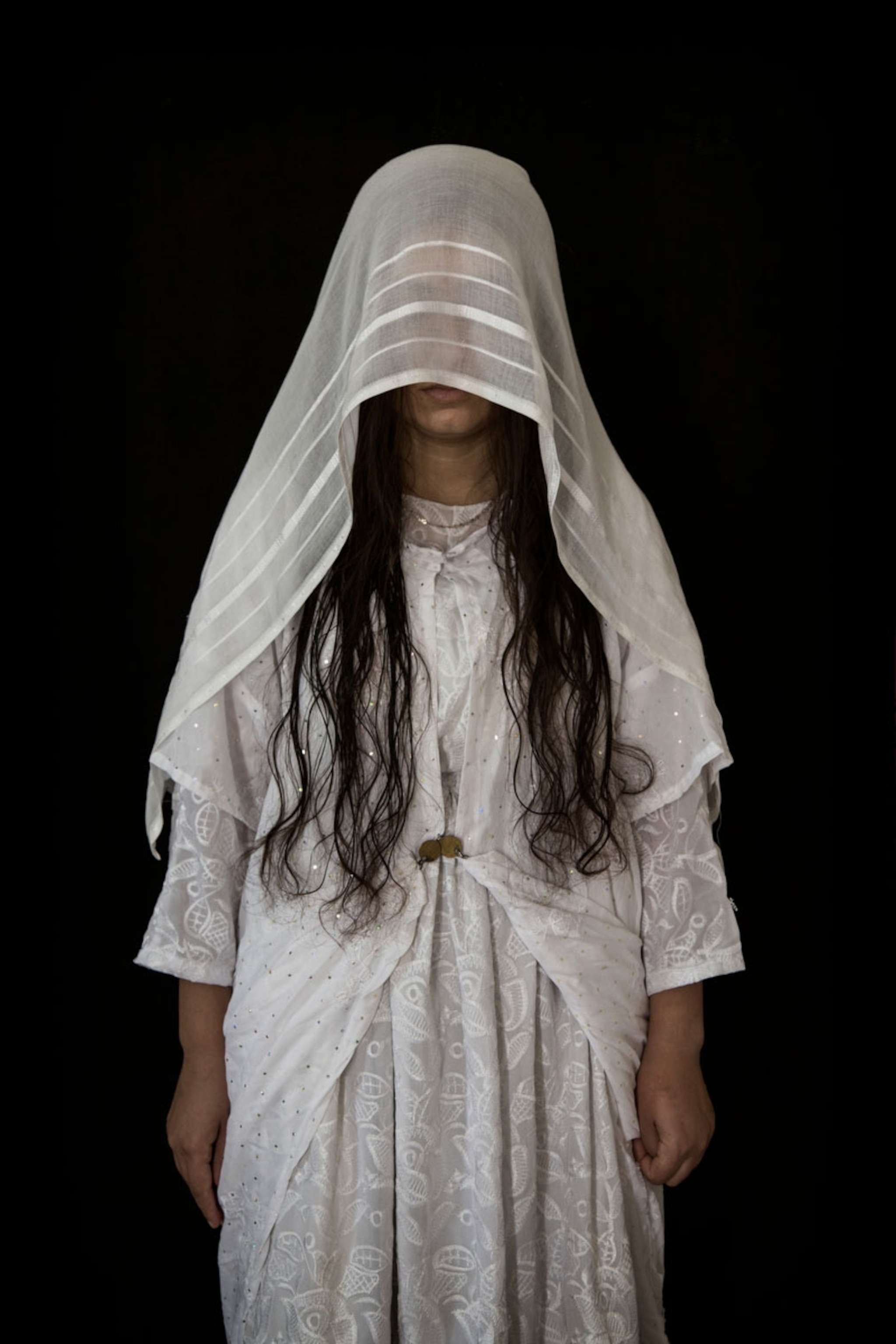 a Yazidi woman who was held as a slave by ISIS