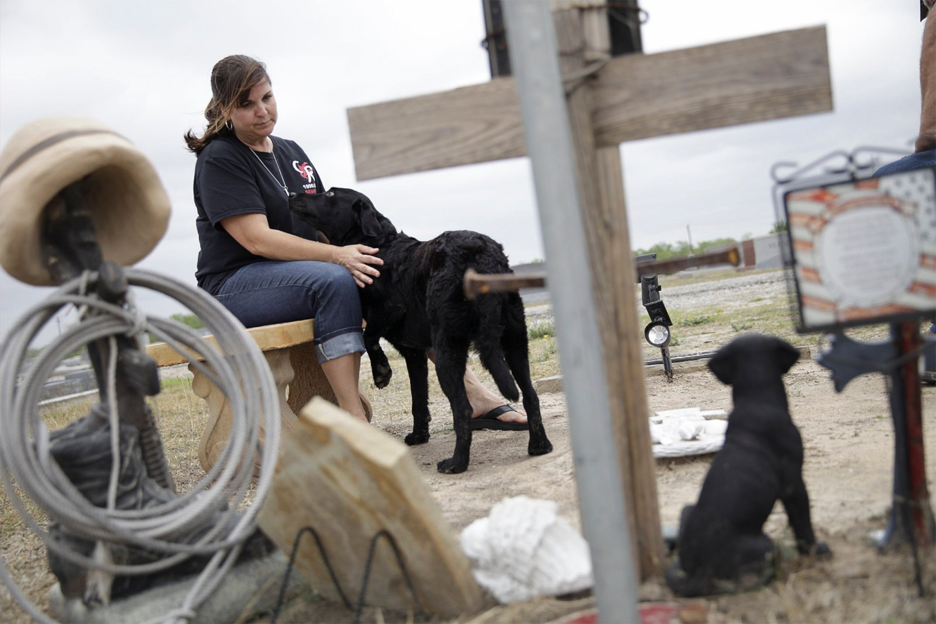 Kathy and Darrell Rusk visiting their son's gravesite.