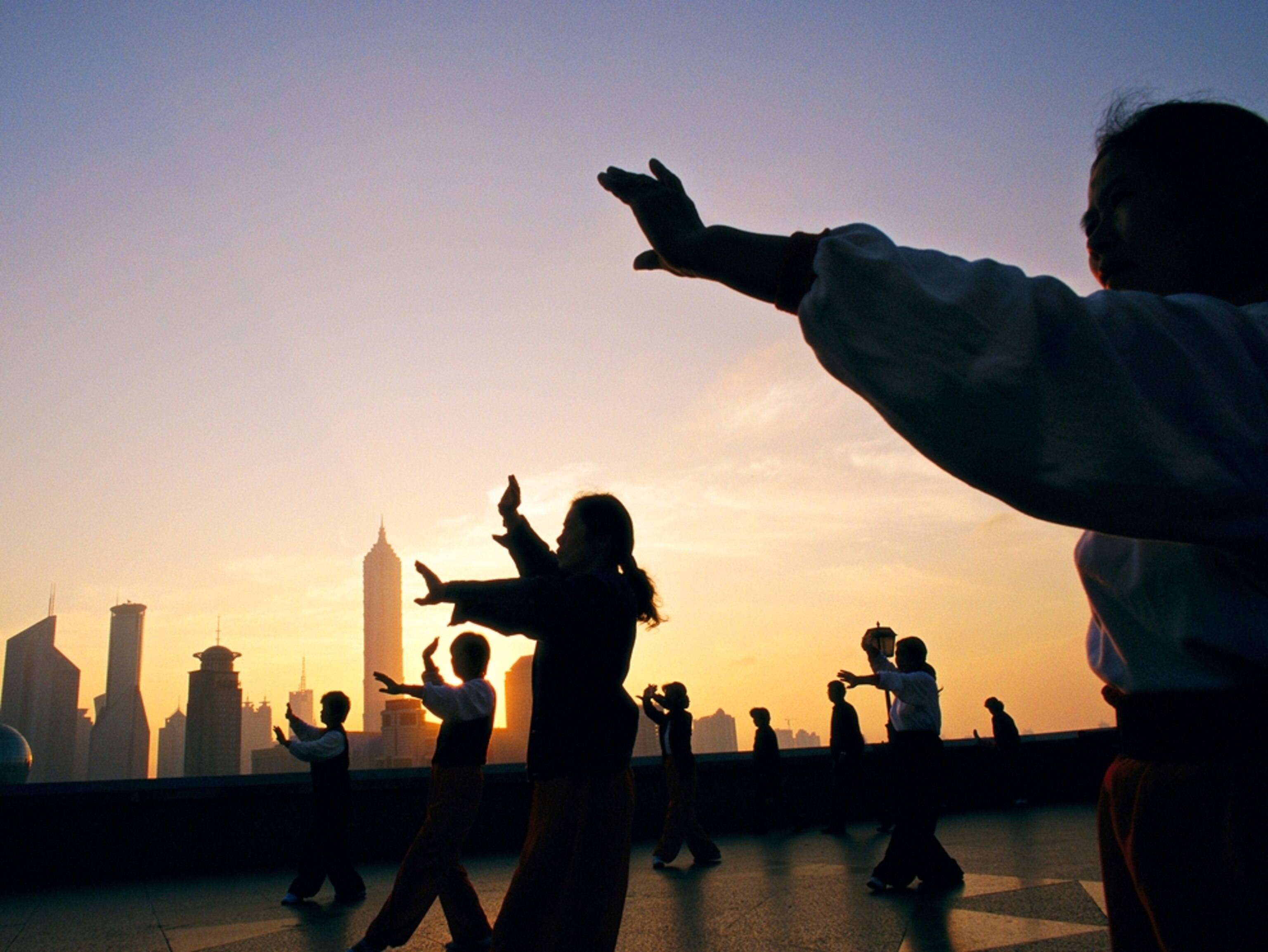 People practicing tai chi