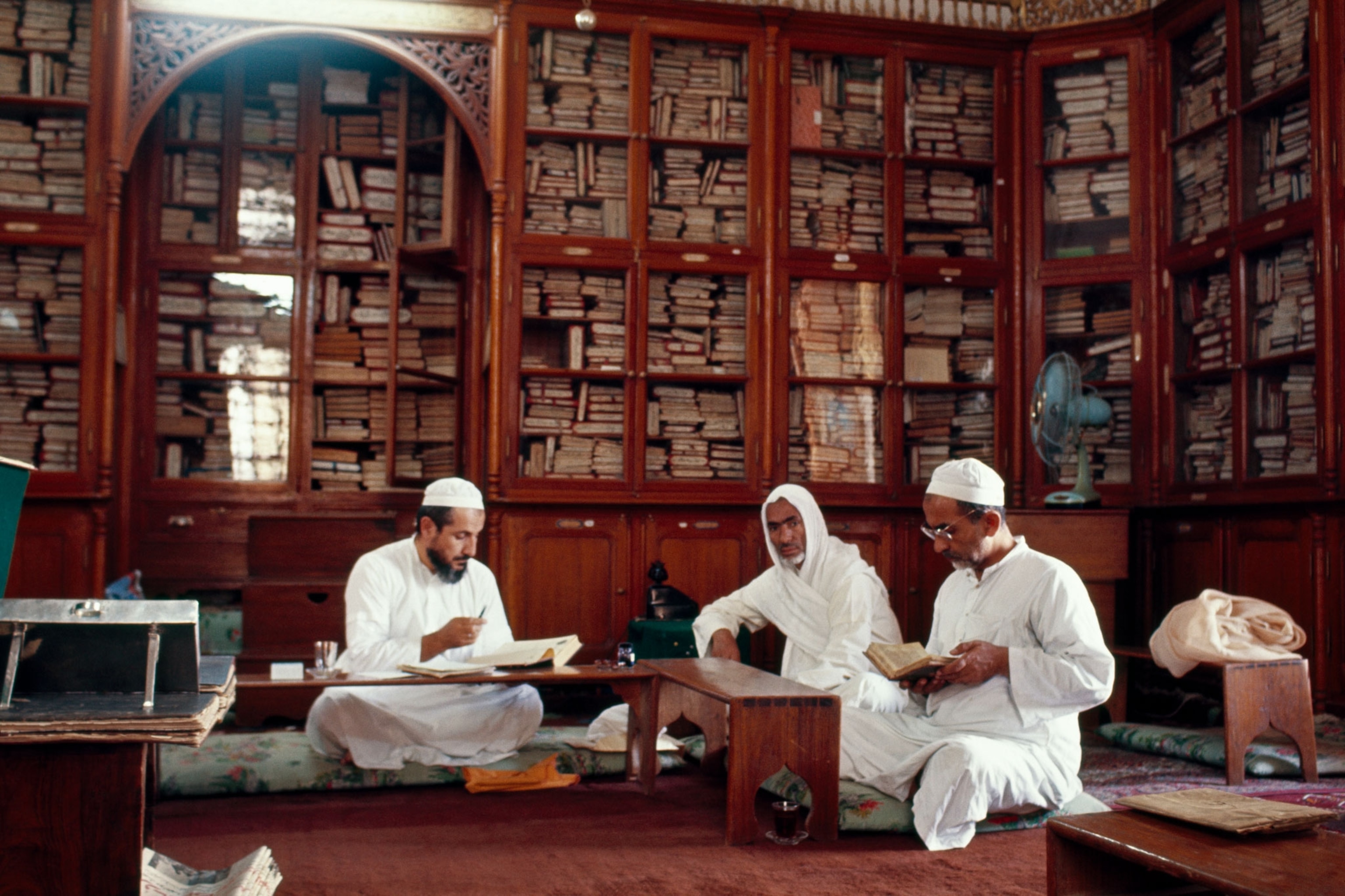 men reading in a library in Saudi Arabia