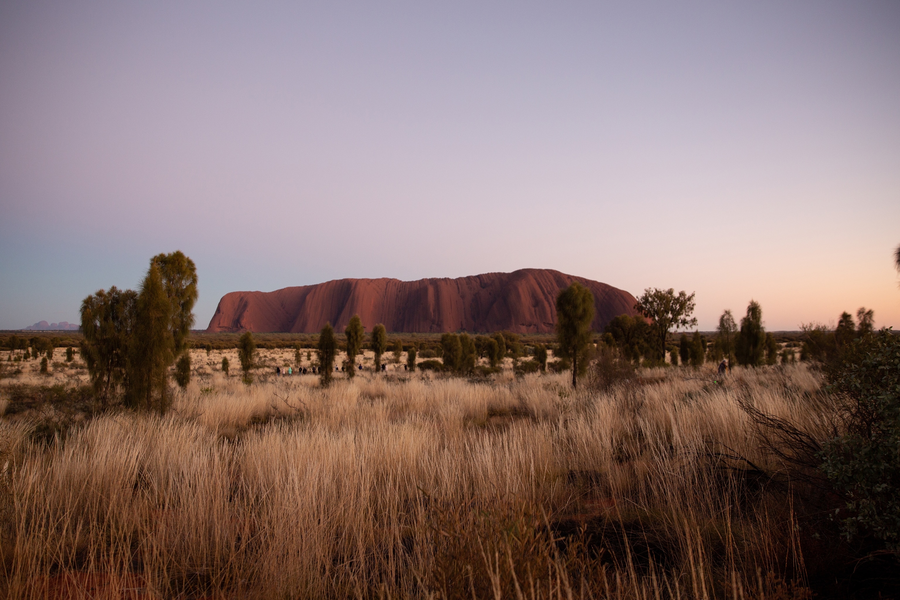 Another angle of Uluru during sunrise. Uluru is the largest sandstone monolith in the world. It is deeply spiritual and sacred to the local Indigenous Anangu people, who have lived here for more than 30,000 years.