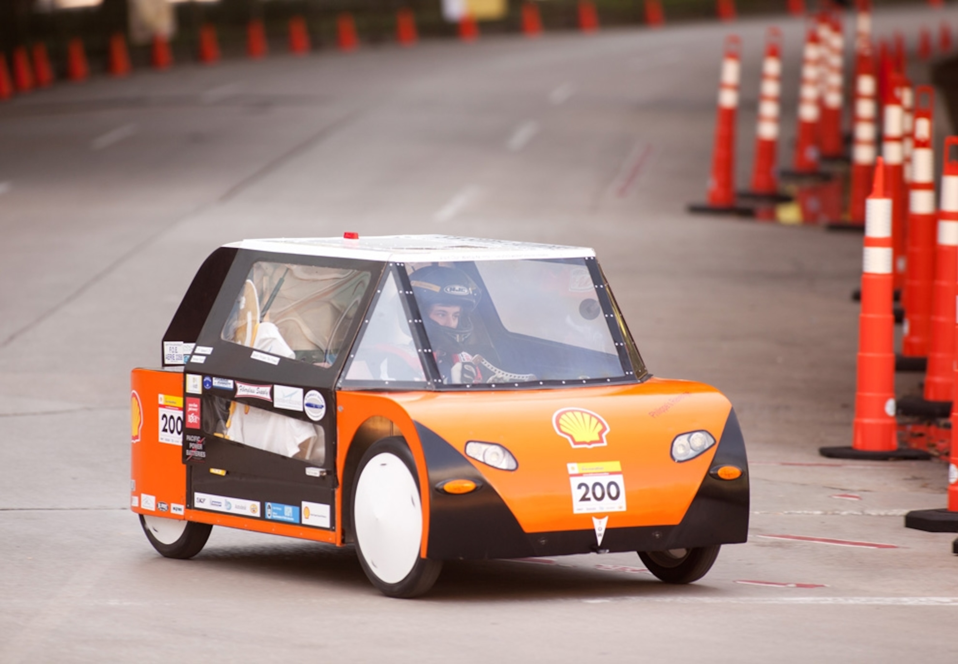 Tiny square vehicle just big enough to accommodate its driver