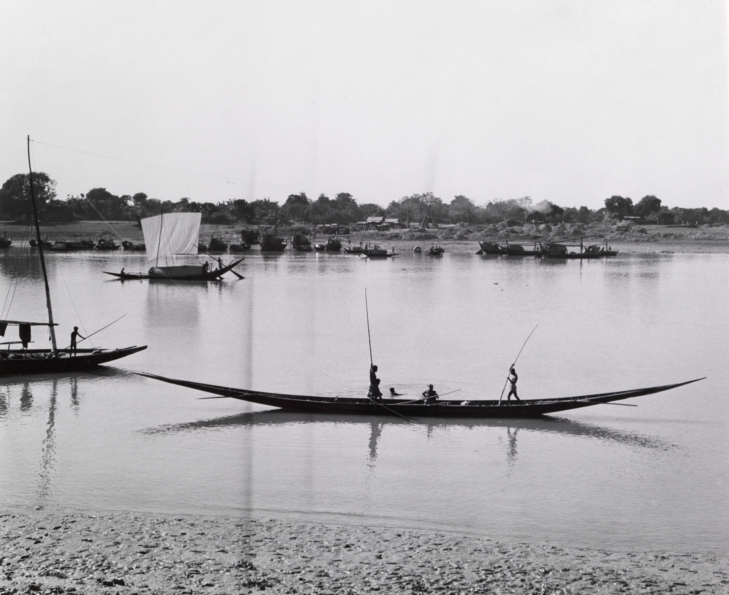 Native dugout canoe on river in East Pakistan.