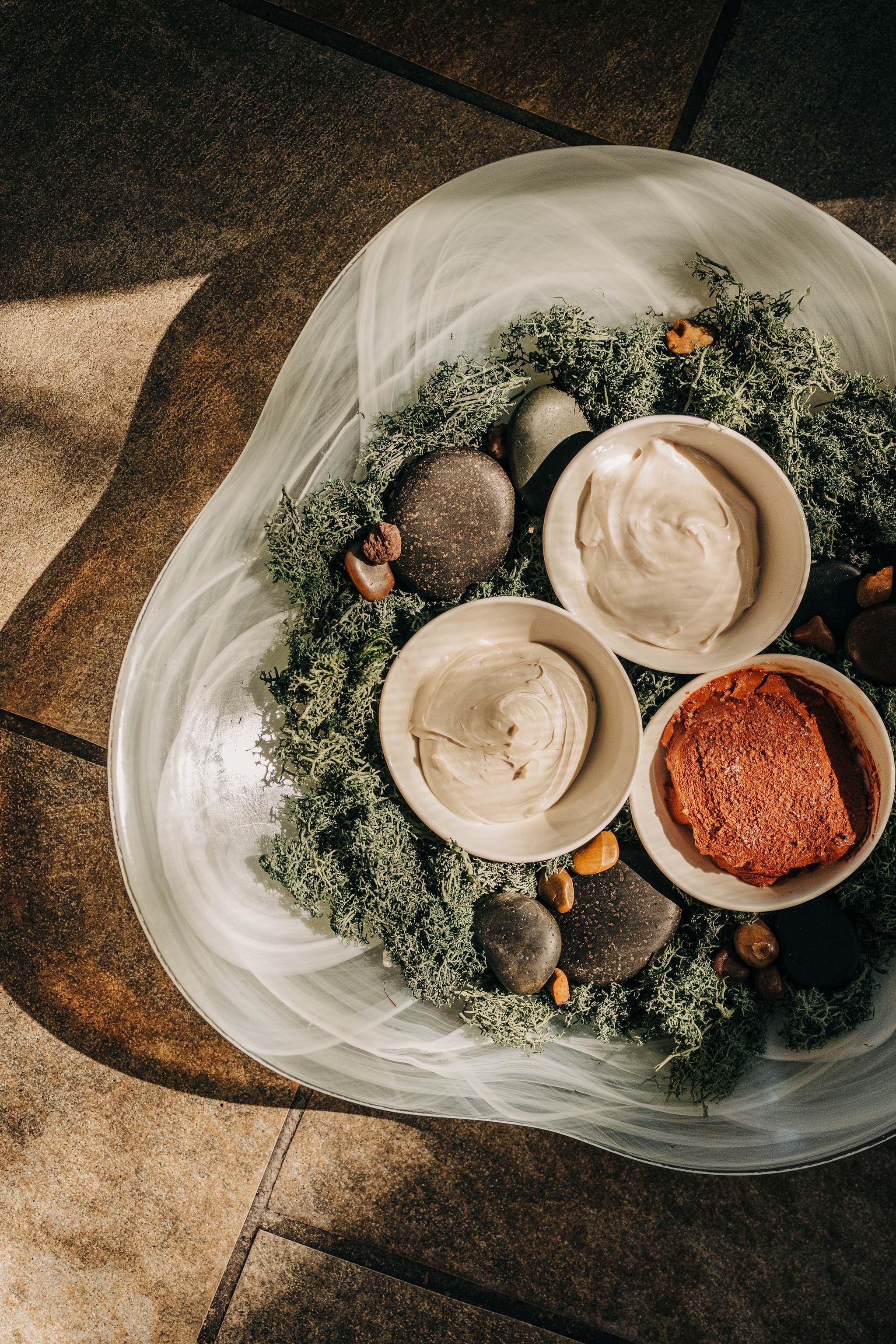 Three pots of clay treatment