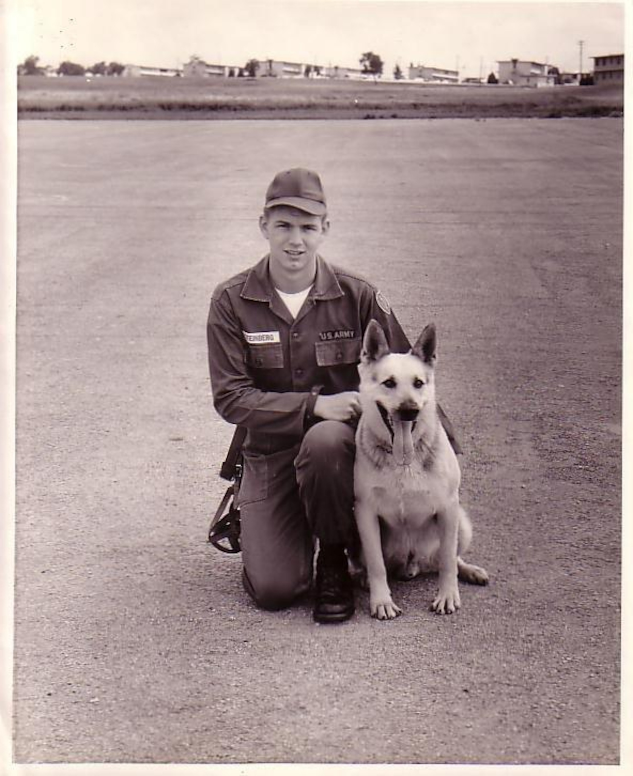 a sentry-dog handler from the U.S. Army with his dog