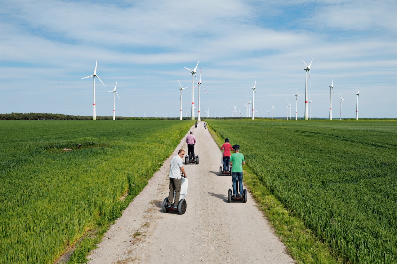 visitors touring a wind park in Germany