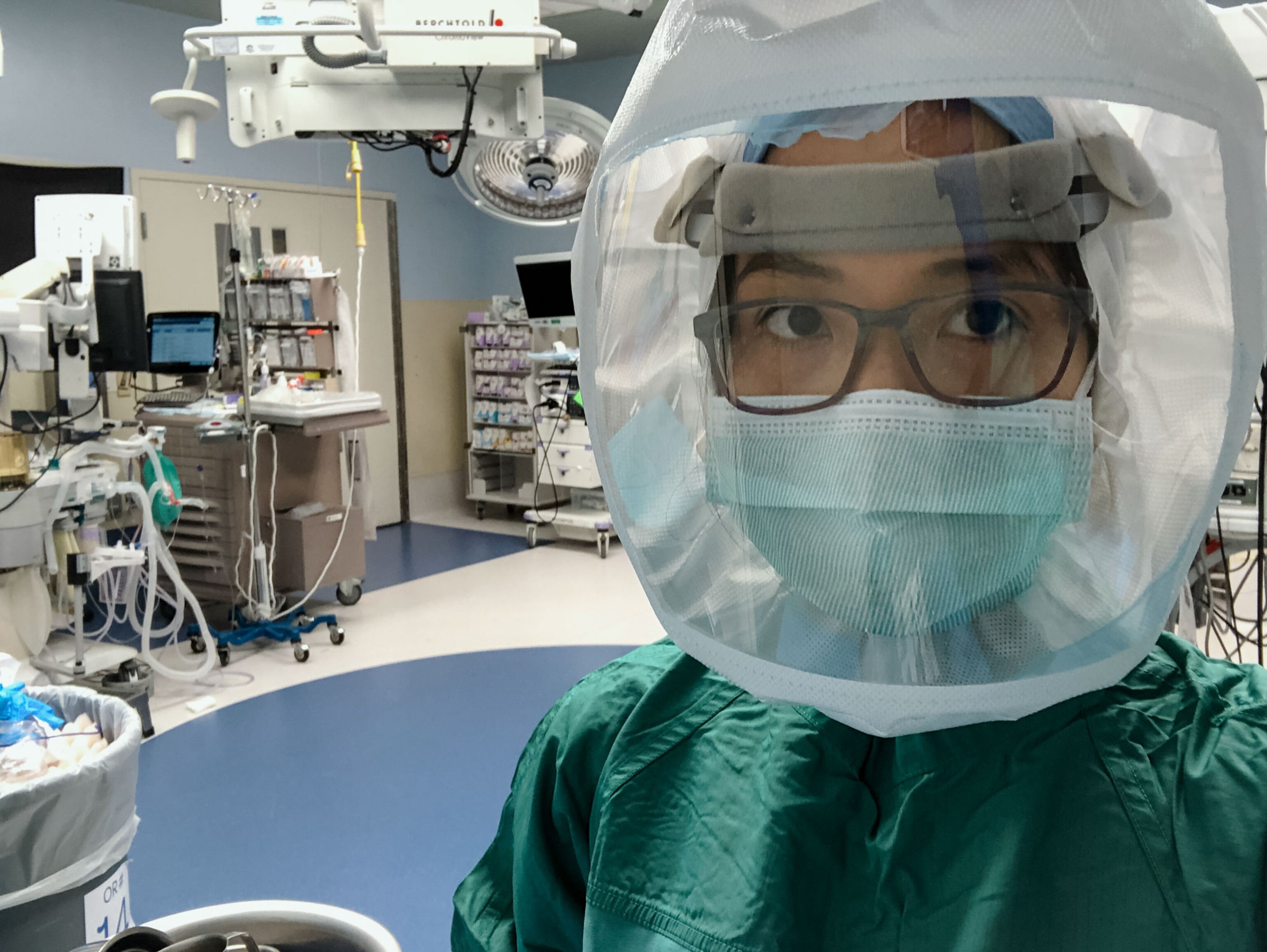 a nurse wearing protective gear in a hospital