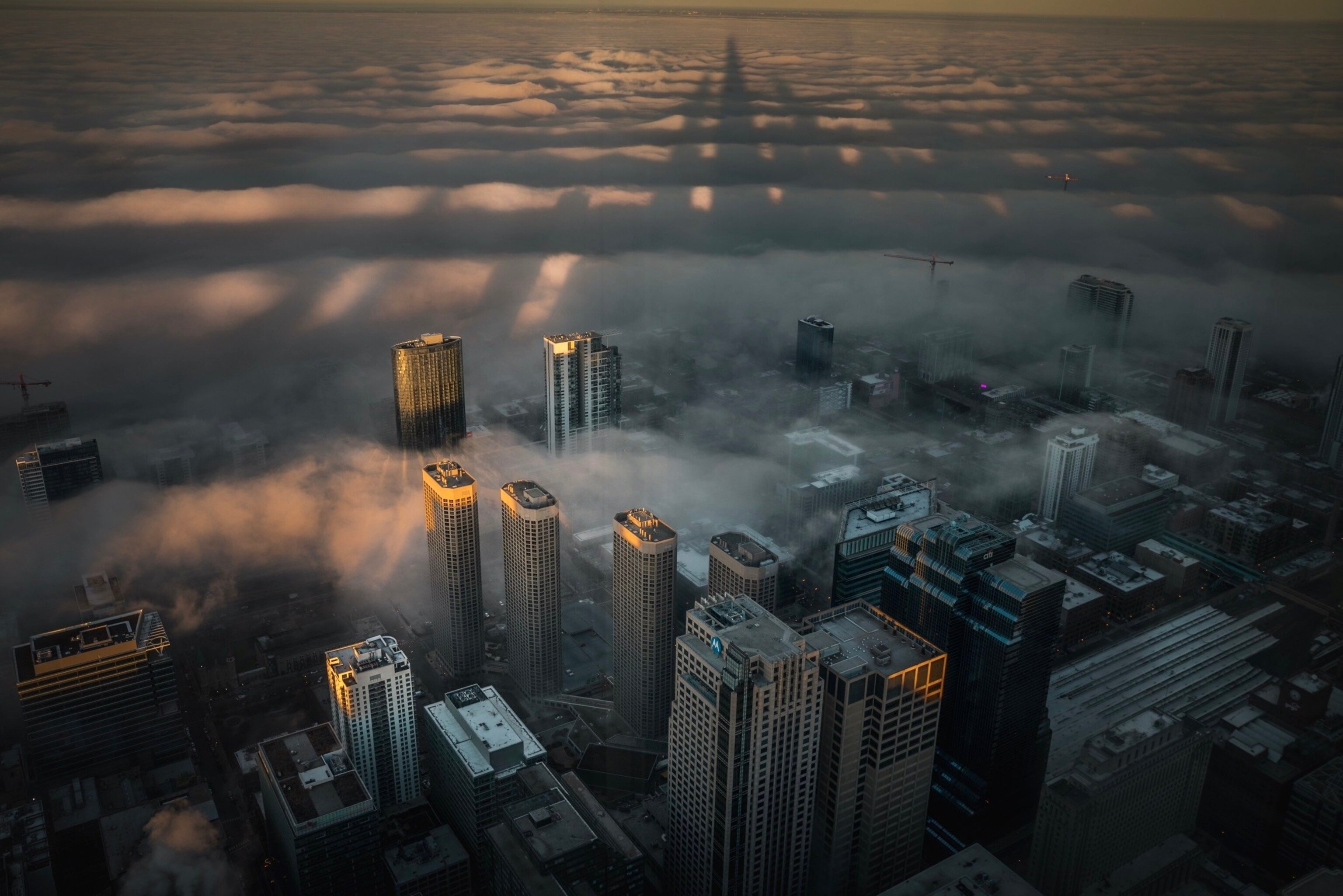 skyline of chicago above the clouds