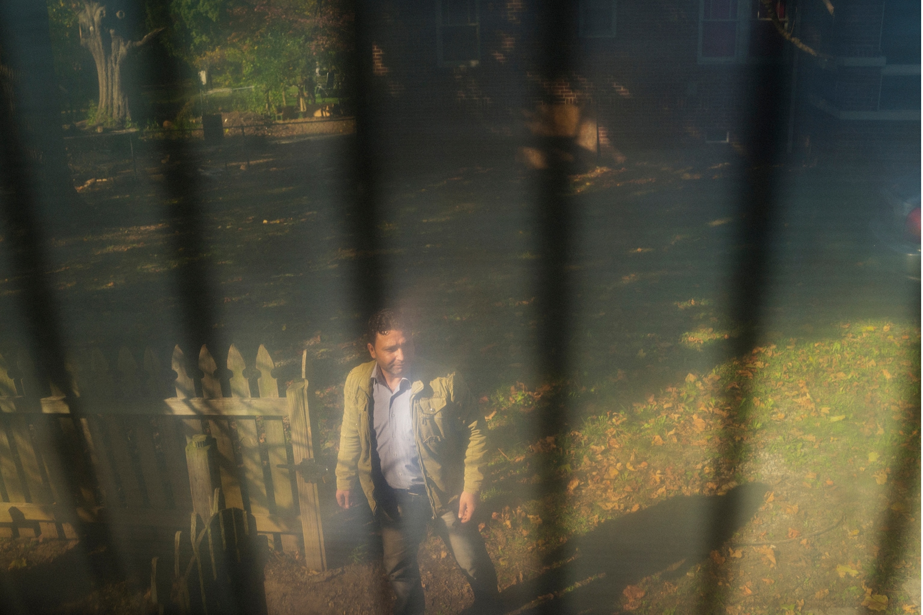 a man standing outside his Greensboro, North Carolina home