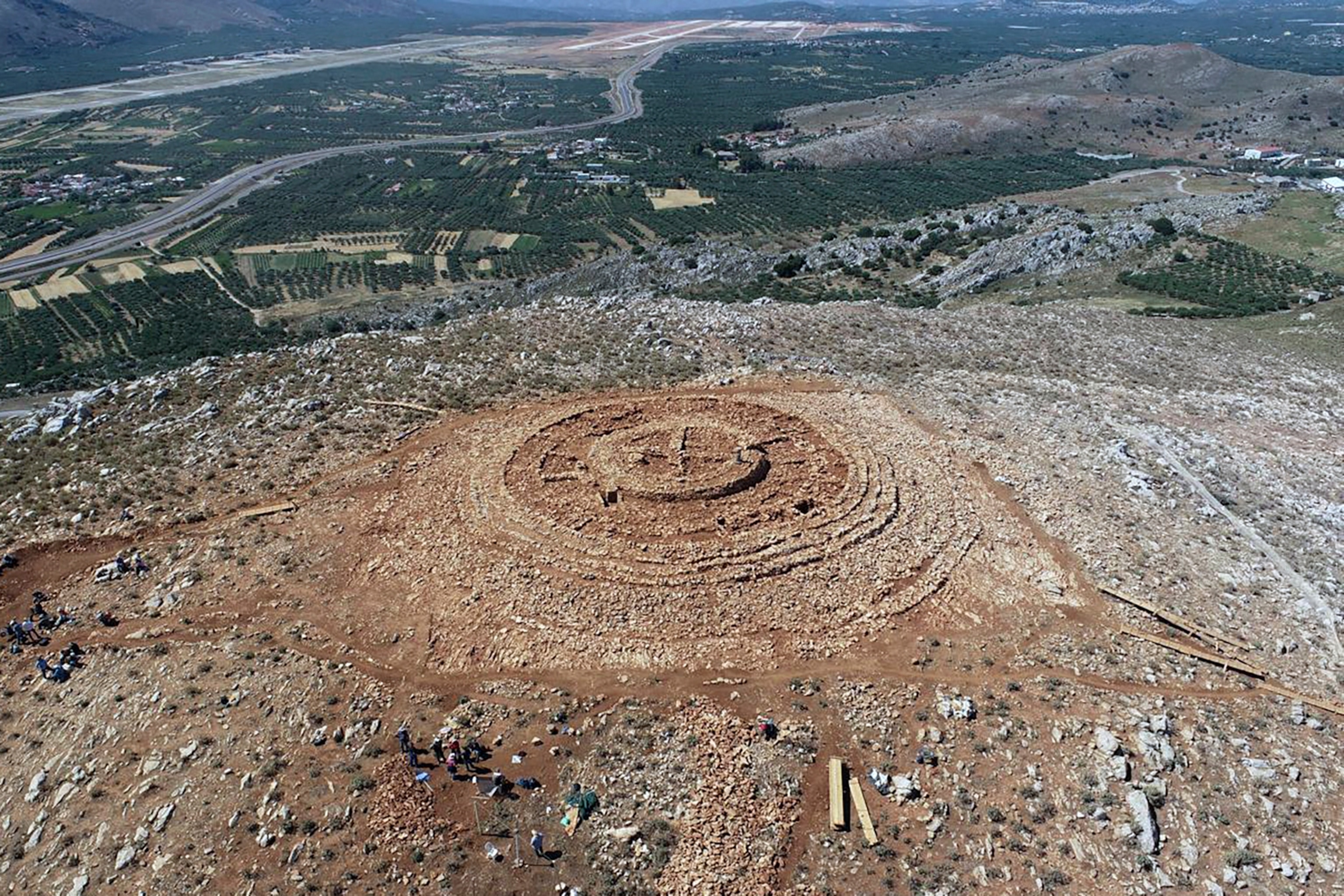 In this undated photo provided by the Greek Culture Ministry on Tuesday, June 11, 2024, the ruins of a 4,000-year-old hilltop building newly discovered on the island of Crete