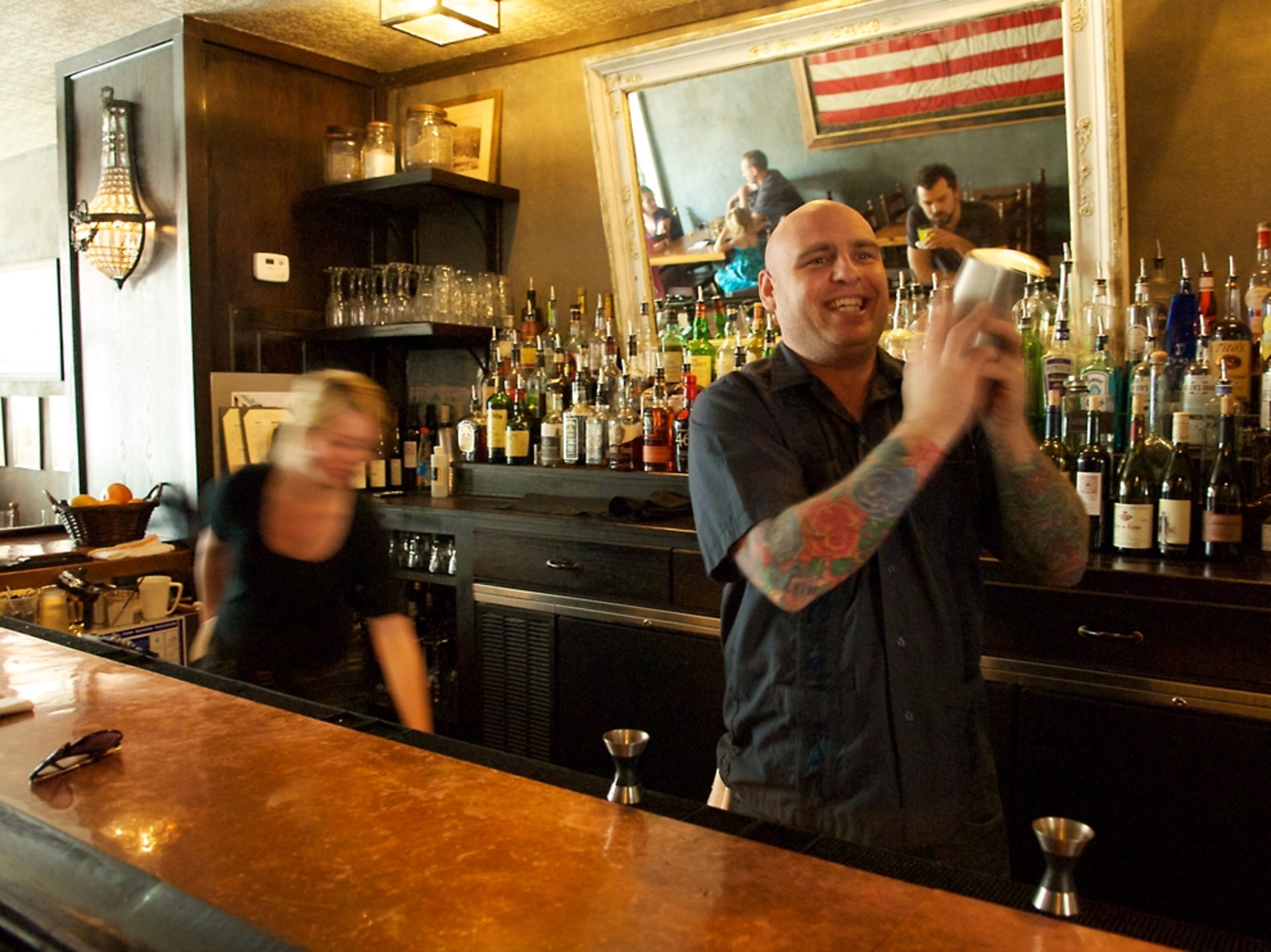 a bar manager at Sylvain making a cocktail