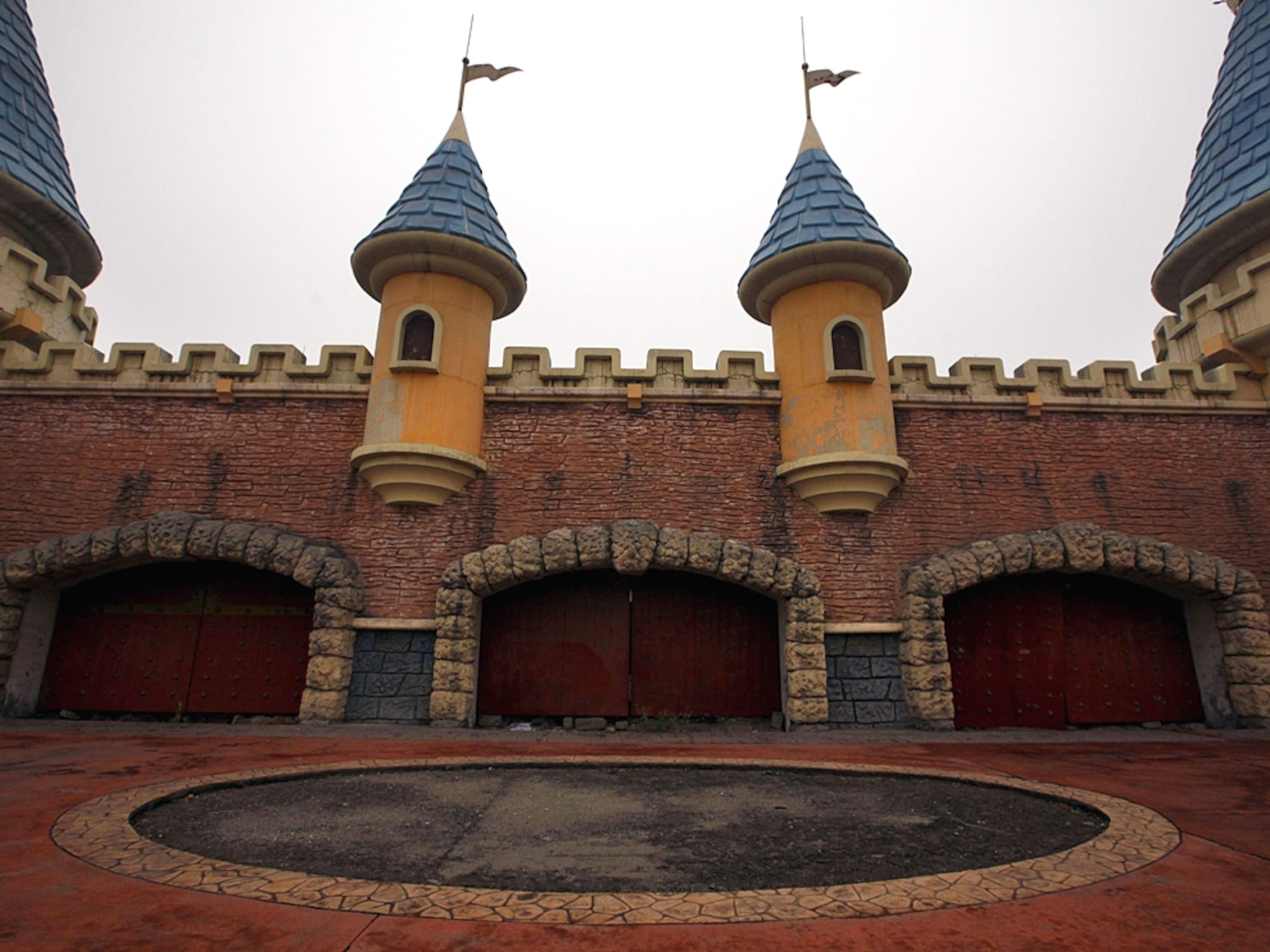 China fake Disneyland picture: abandoned buildings, for a gallery on Wonderland, an abandoned project to build an amusement park outside of Beijing, China