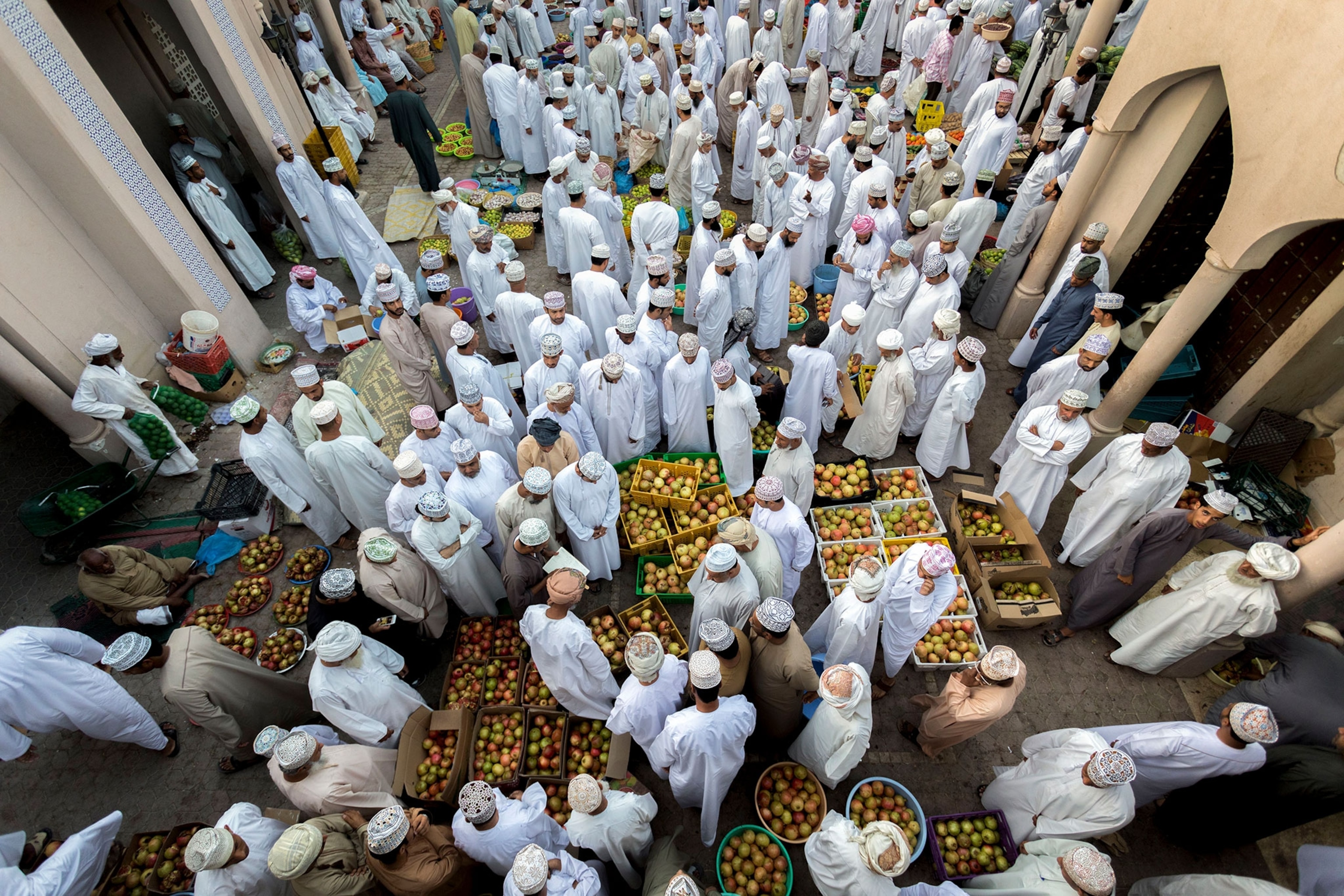 a busy pomegranate market