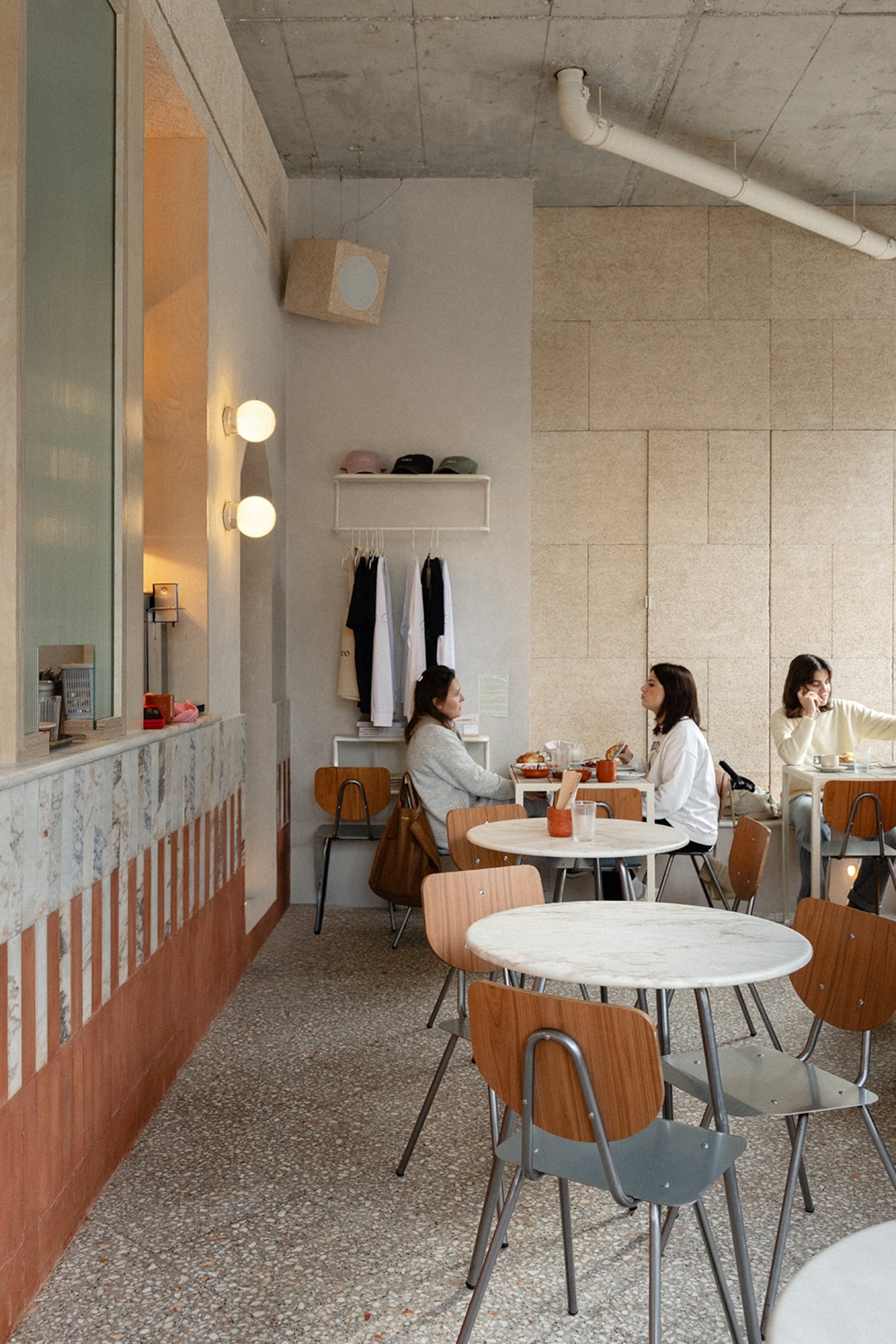 The interior of a sleek and modern coffee shop.