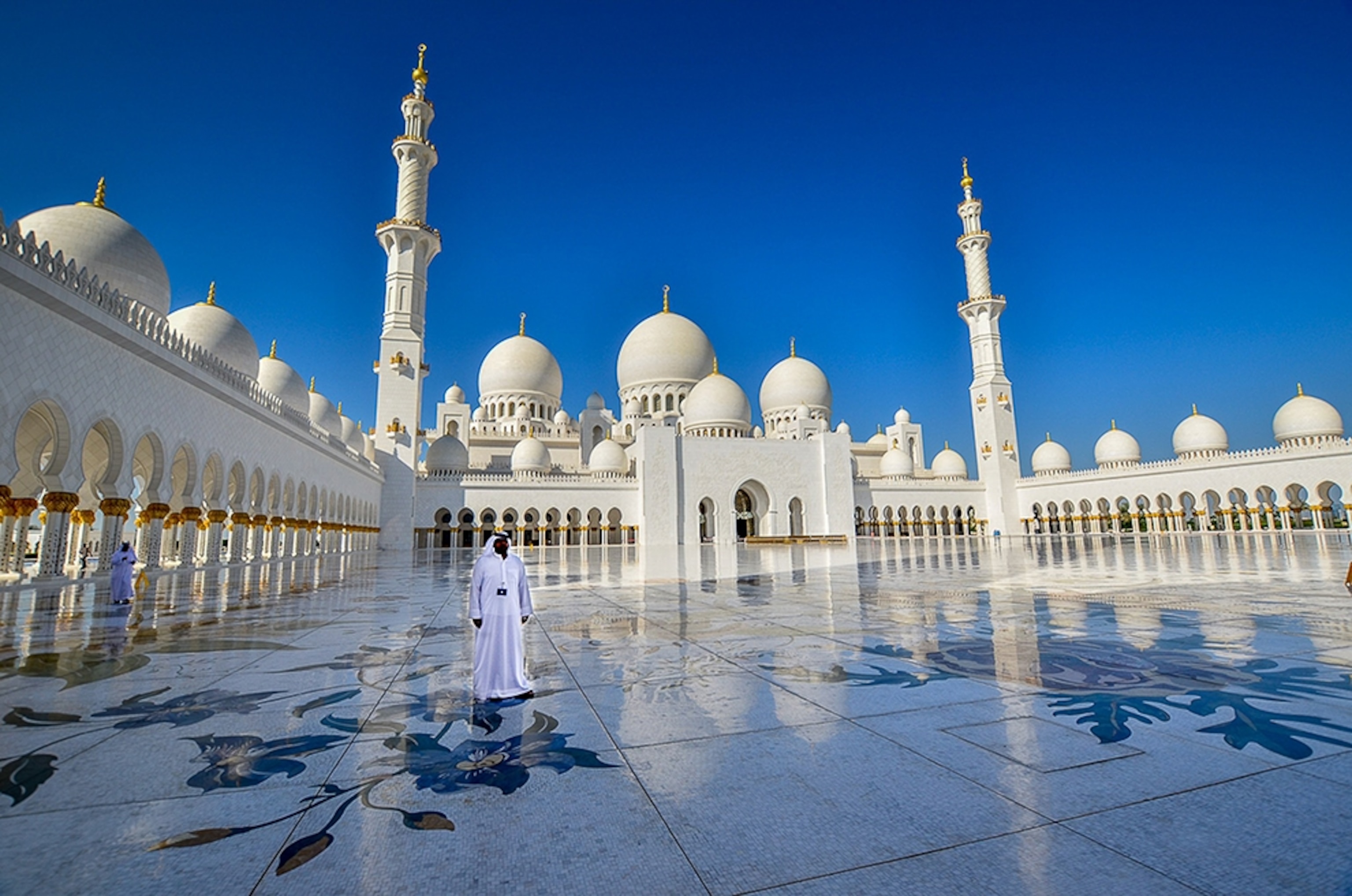 the courtyard of the Sheikh Zayed Mosque in Abu Dhabi