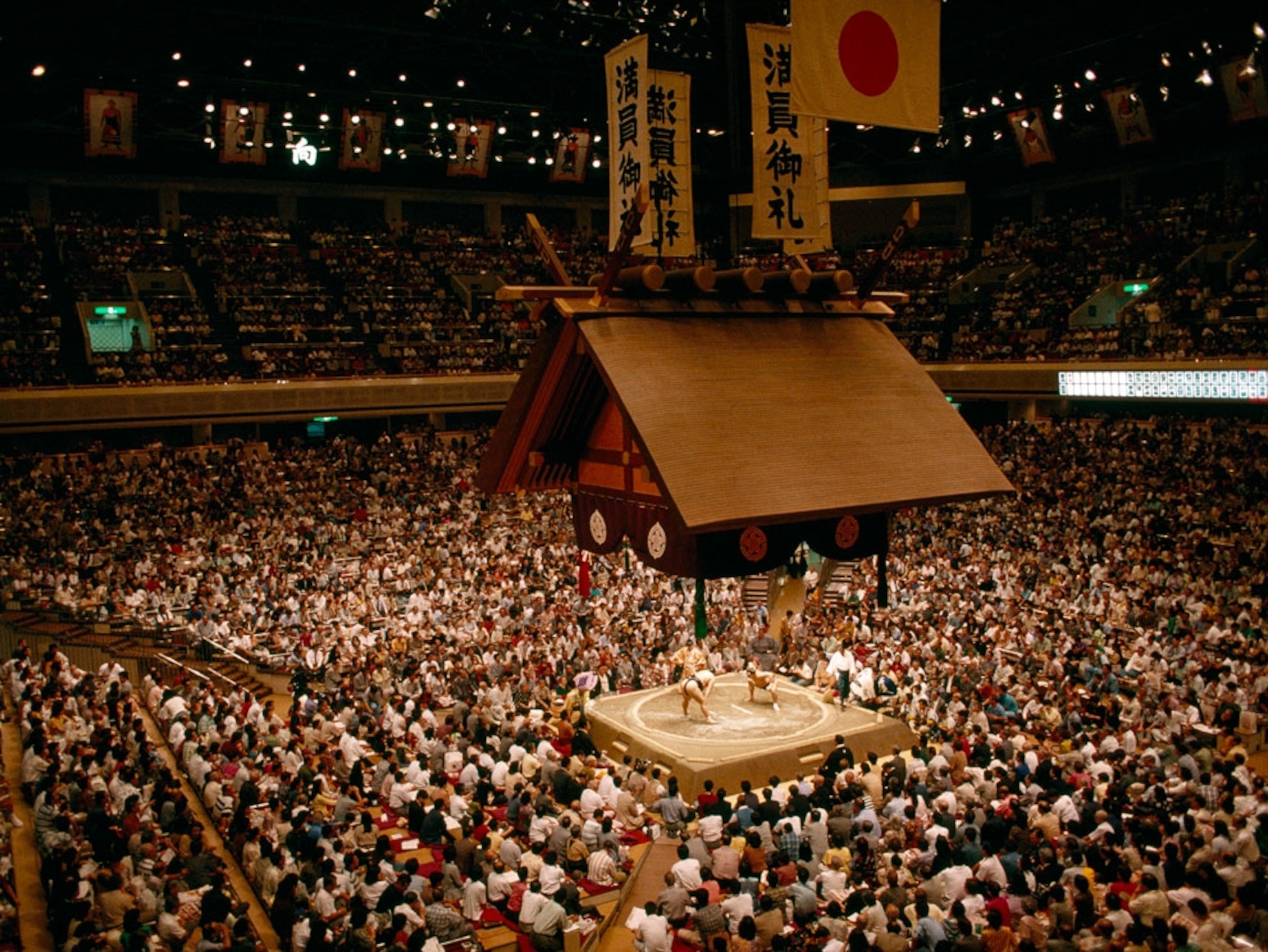 Crowd of spectators at sumo match