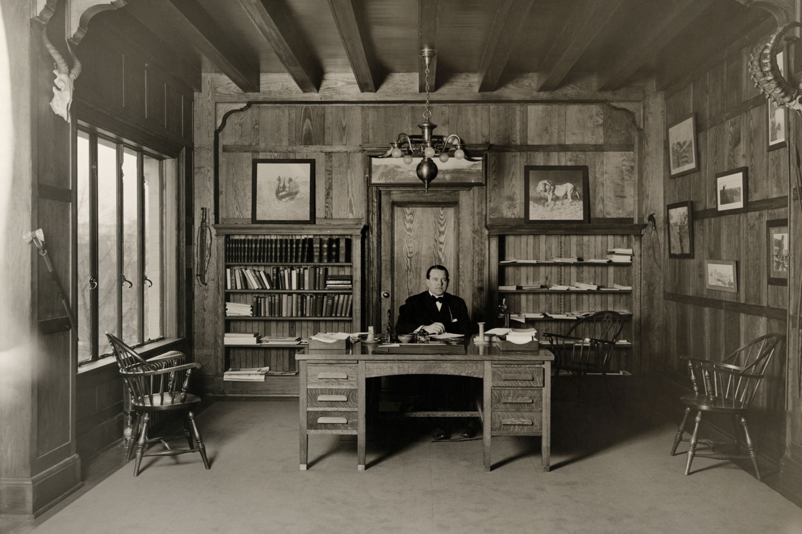 a man sitting at his desk