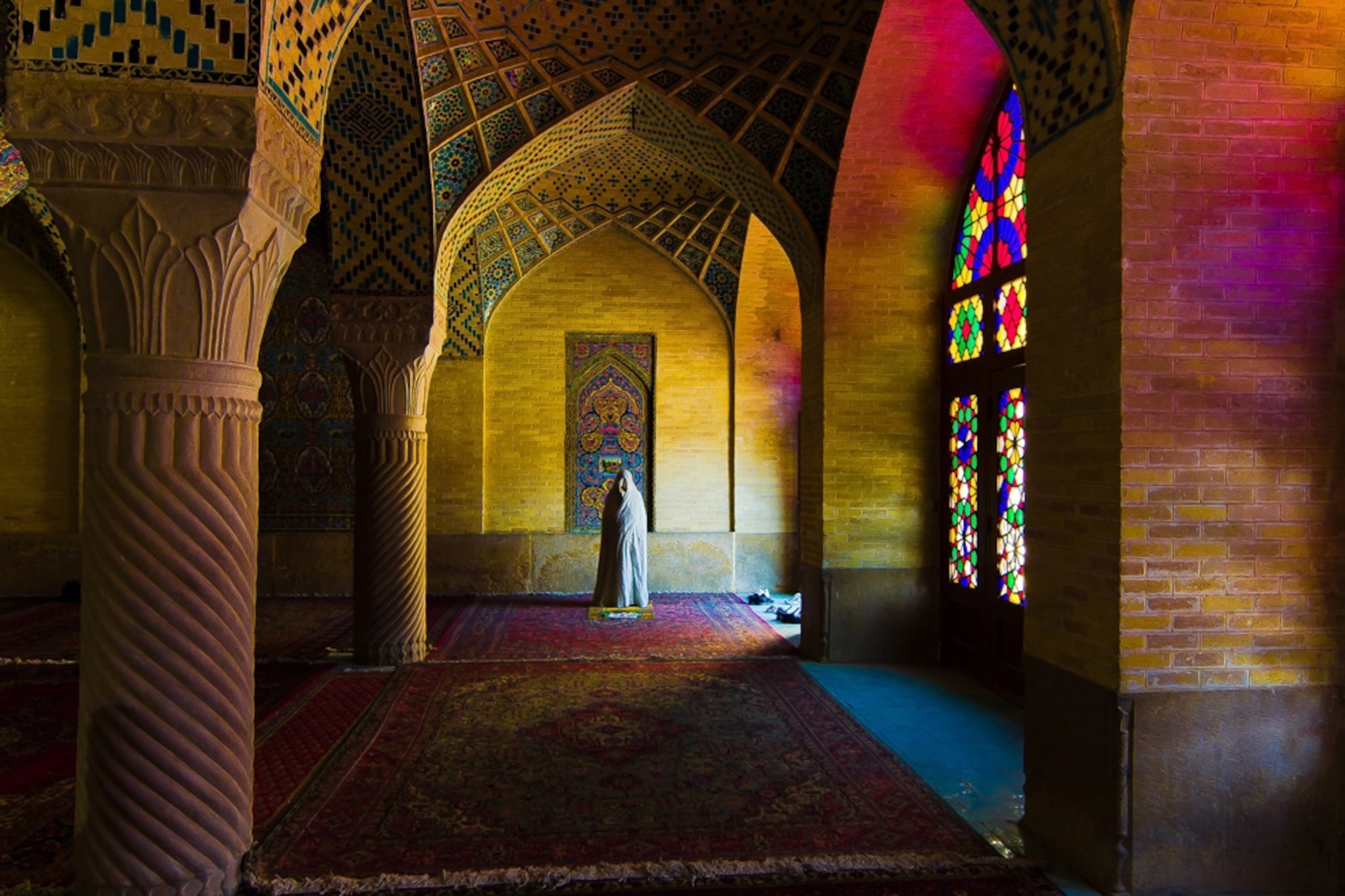 a woman inside a mosque in Iran
