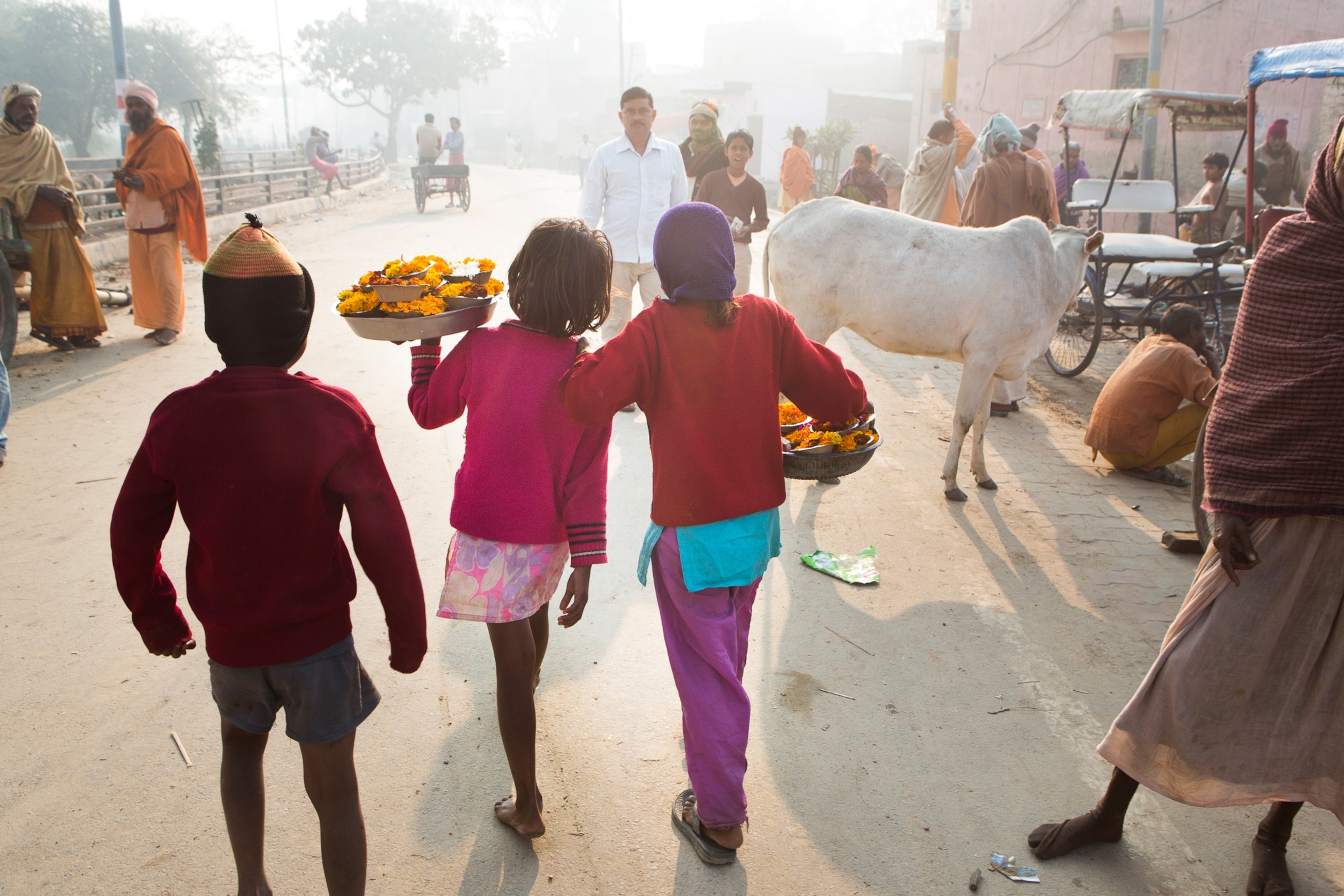 children selling flowers