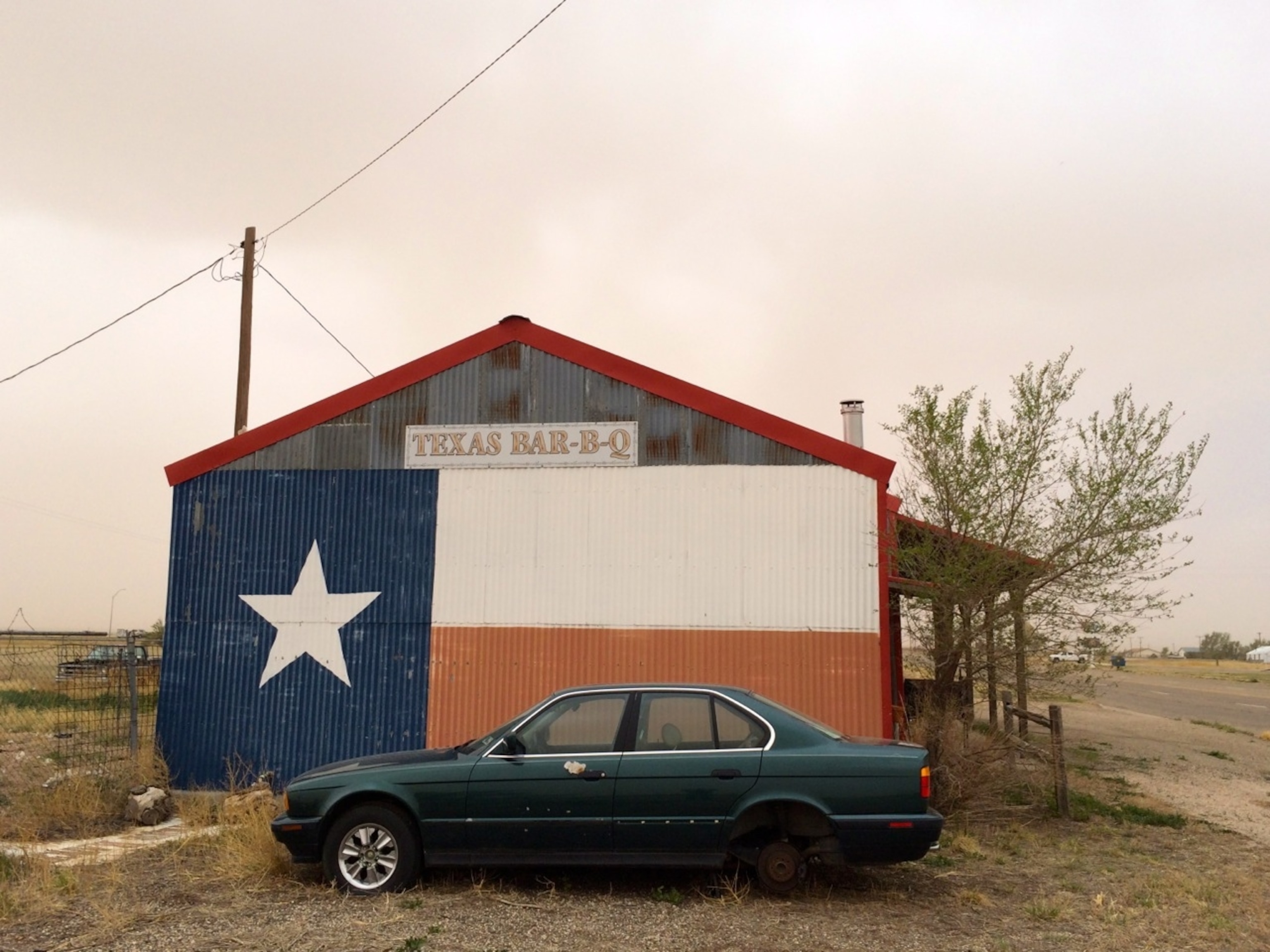 The Texas flag decorates the side of a former barbecue joint on Route 66 in the Texas Panhandle. (Photo by Andrew Evans, National Geographic Travel)