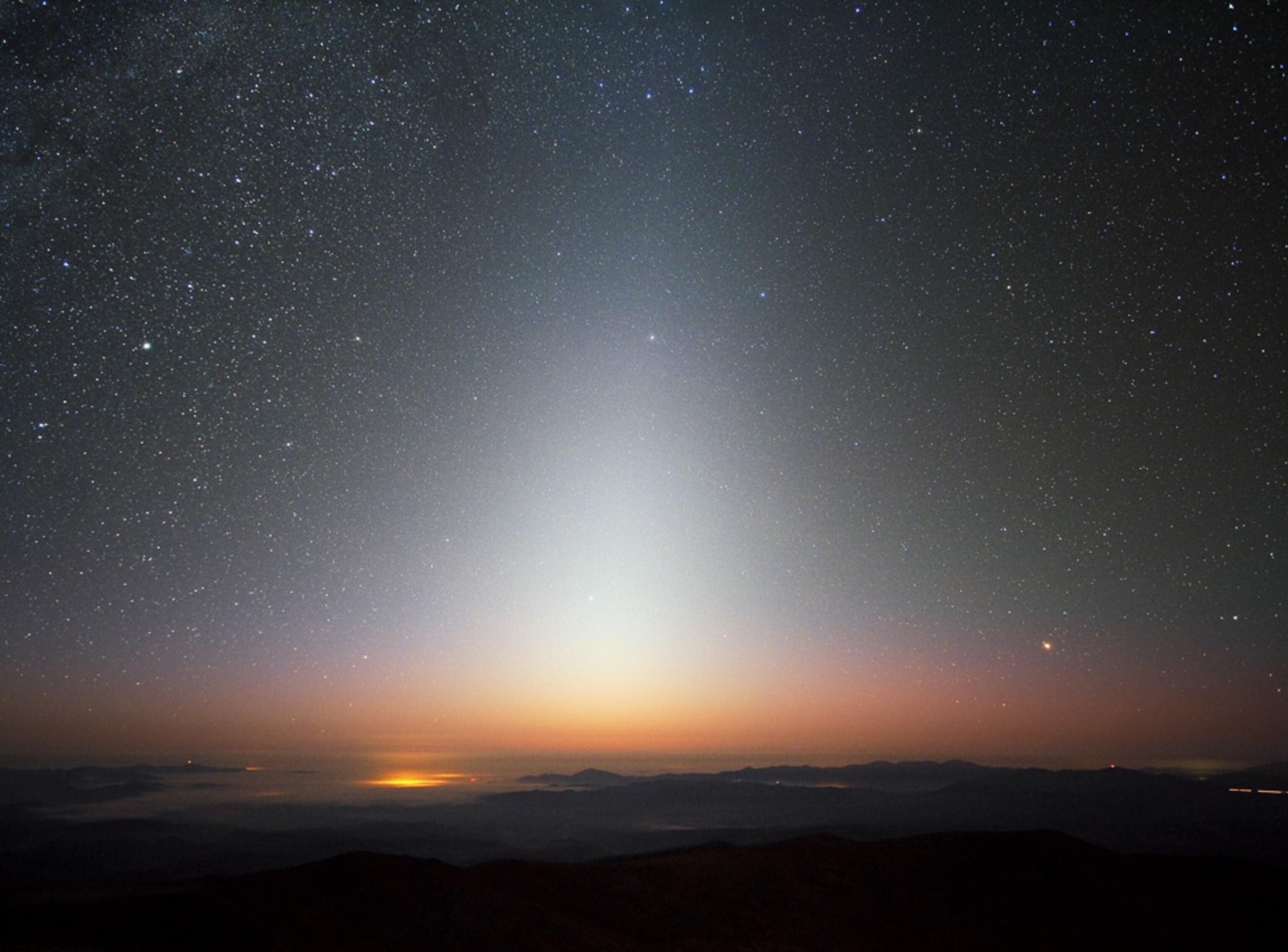 A pyramid of light over La Silla, Chile