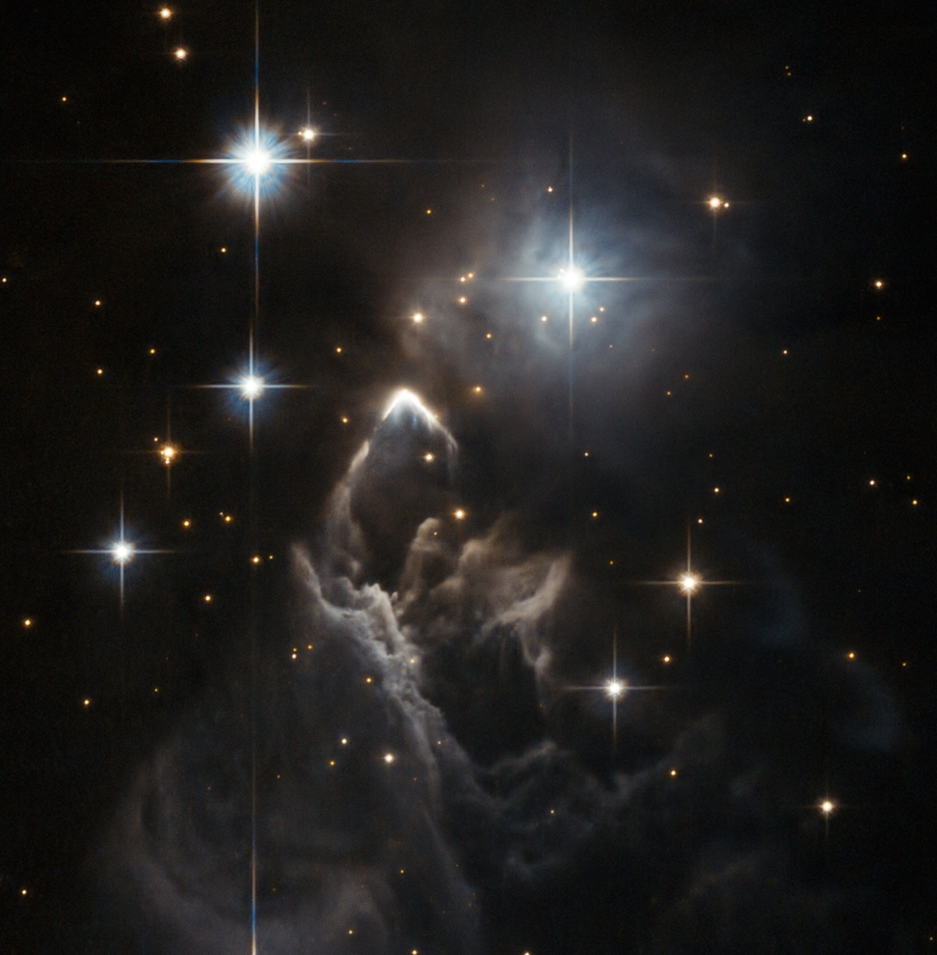 a boomerang-shaped feature in a distant, little-known nebula.