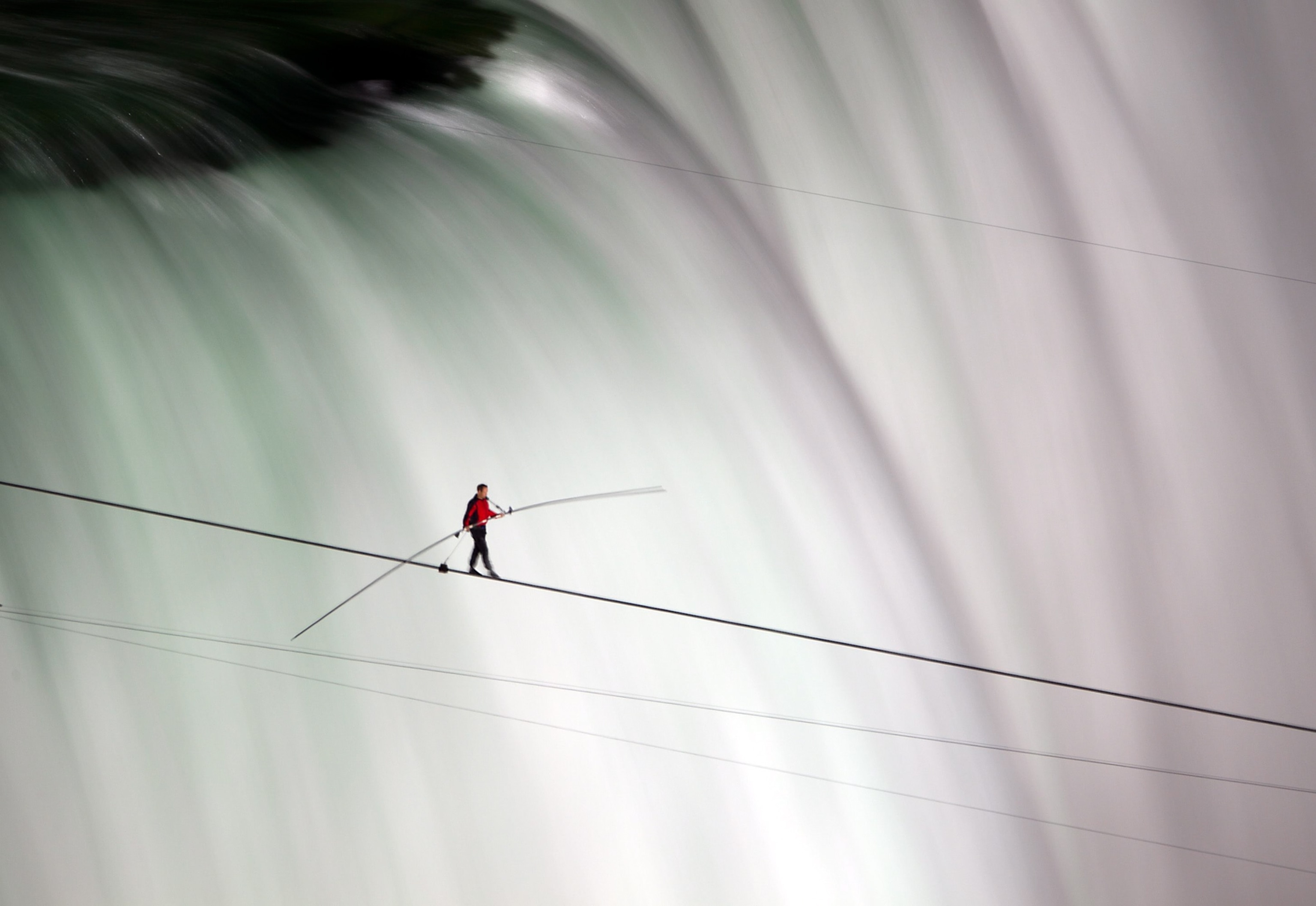 Nik Wallenda picture: crossing Niagara Falls on tightrope -- for best pictures of the month gallery