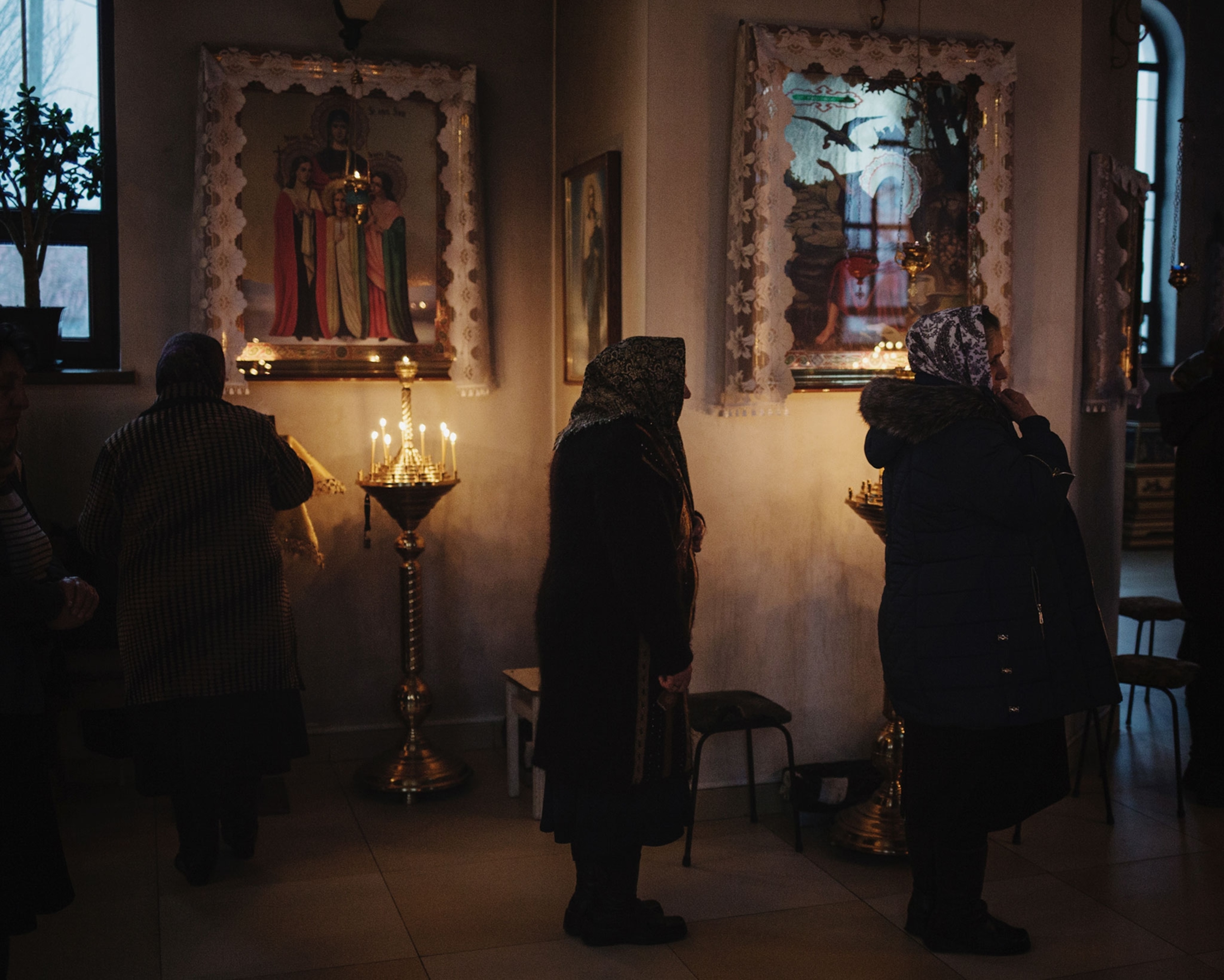 women attending evening mass