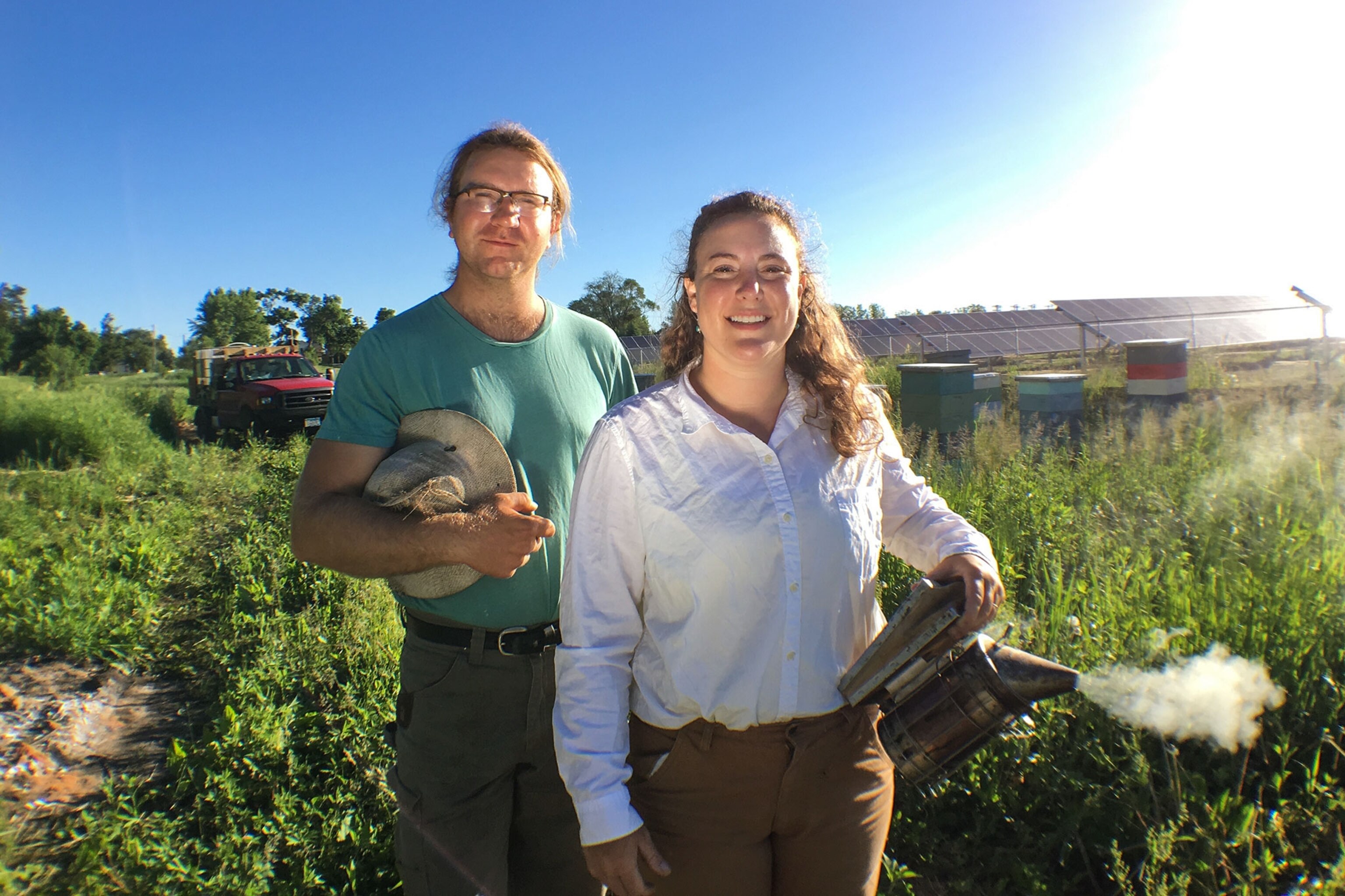 two beekeepers