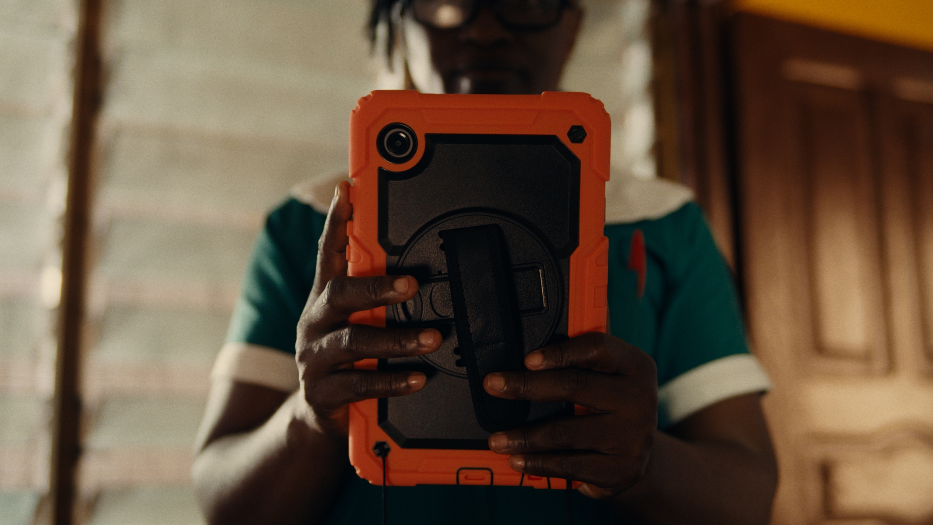 A child’s face is captured on a tablet as one of the key biometric markers that AI will use to map projected changes over time, allowing their medical ID to grow with them.