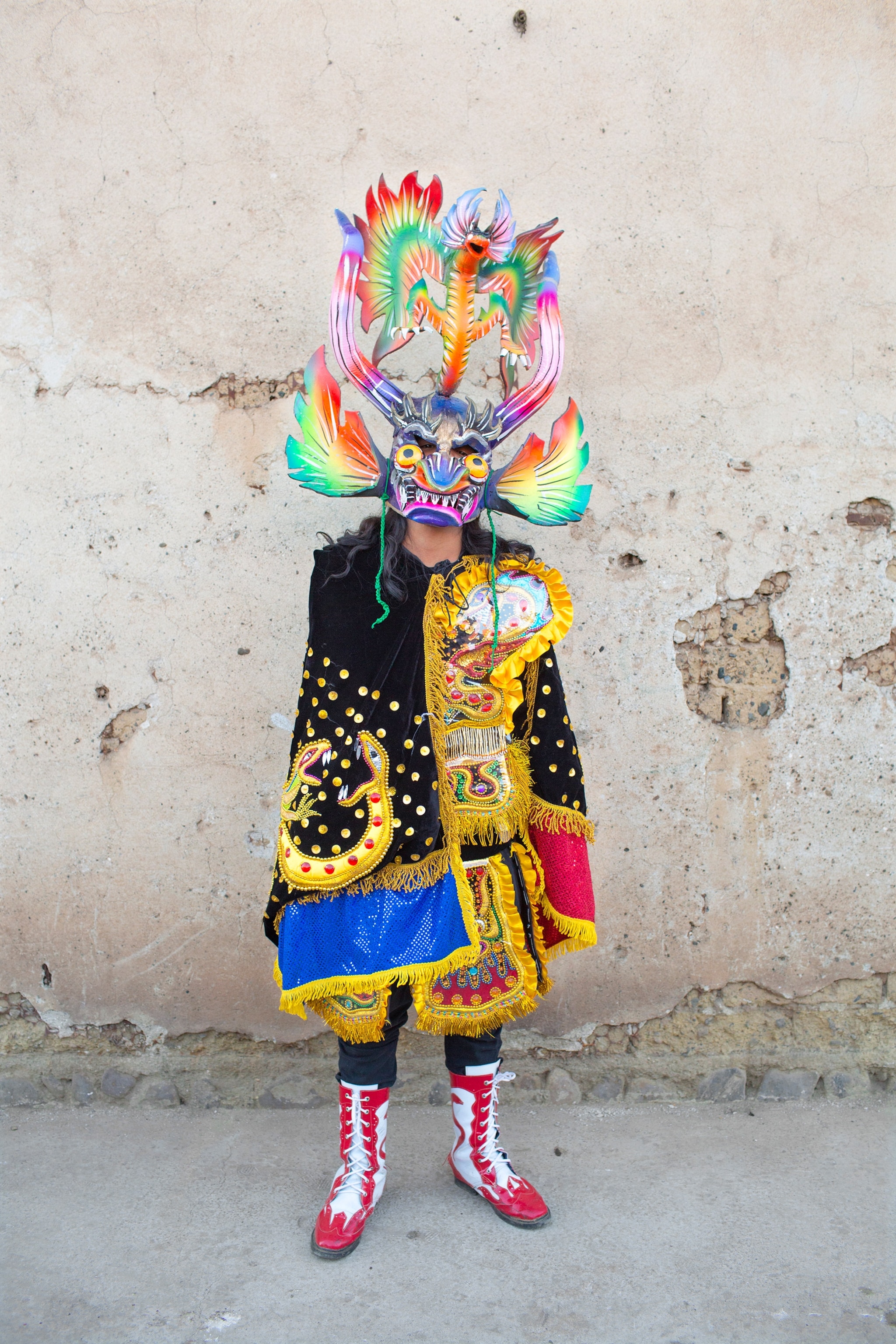 man wearing a traditional costume in La Paz, Bolivia